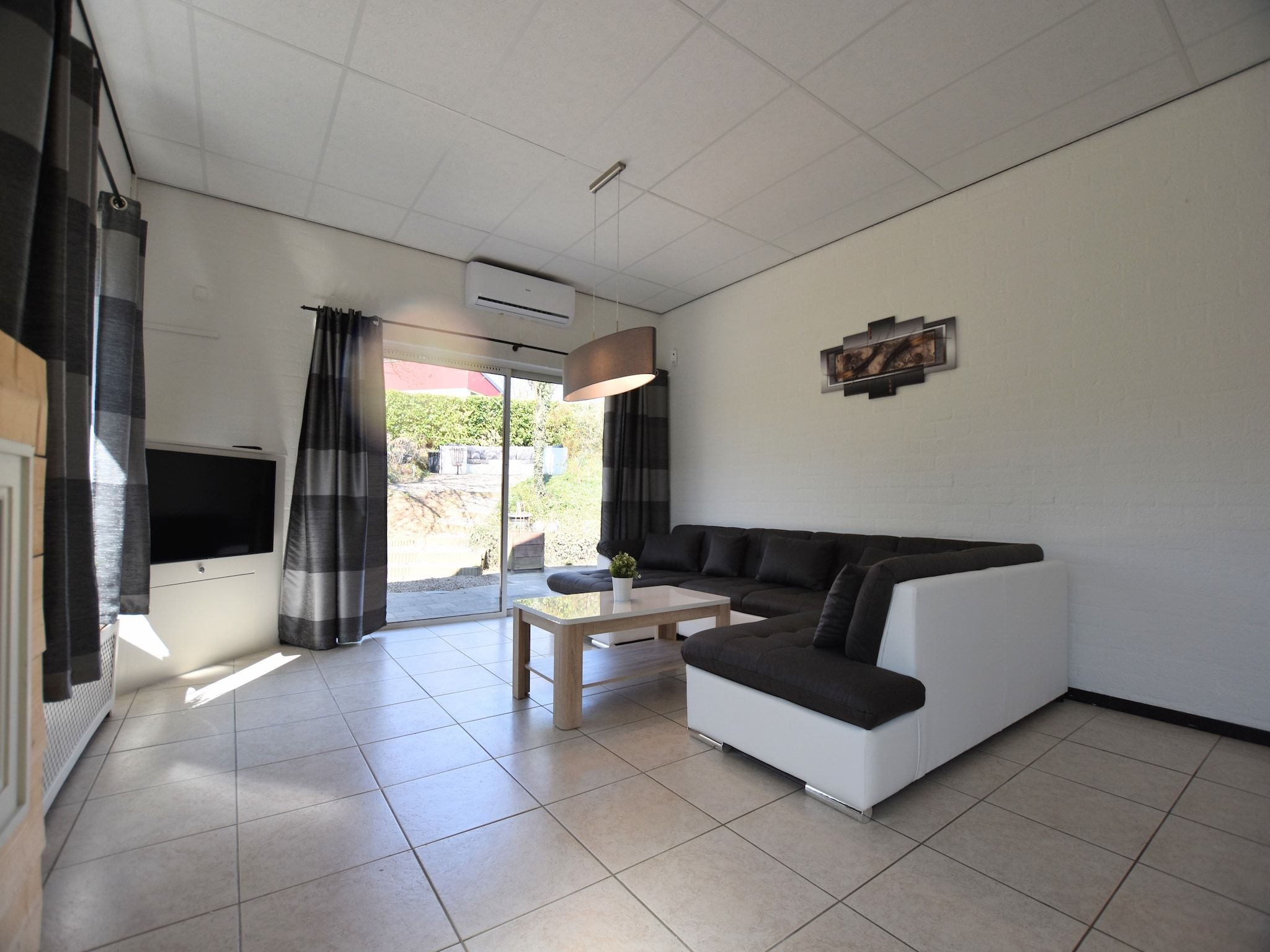 De woonkamer van Geulhuisje II in Walem