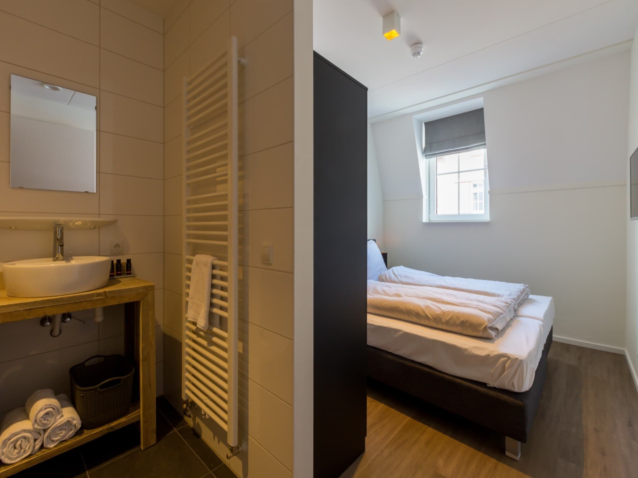Een slaapkamer van Appartement Duinhof Dishoek 13F - 6 personen sauna in Koudekerke