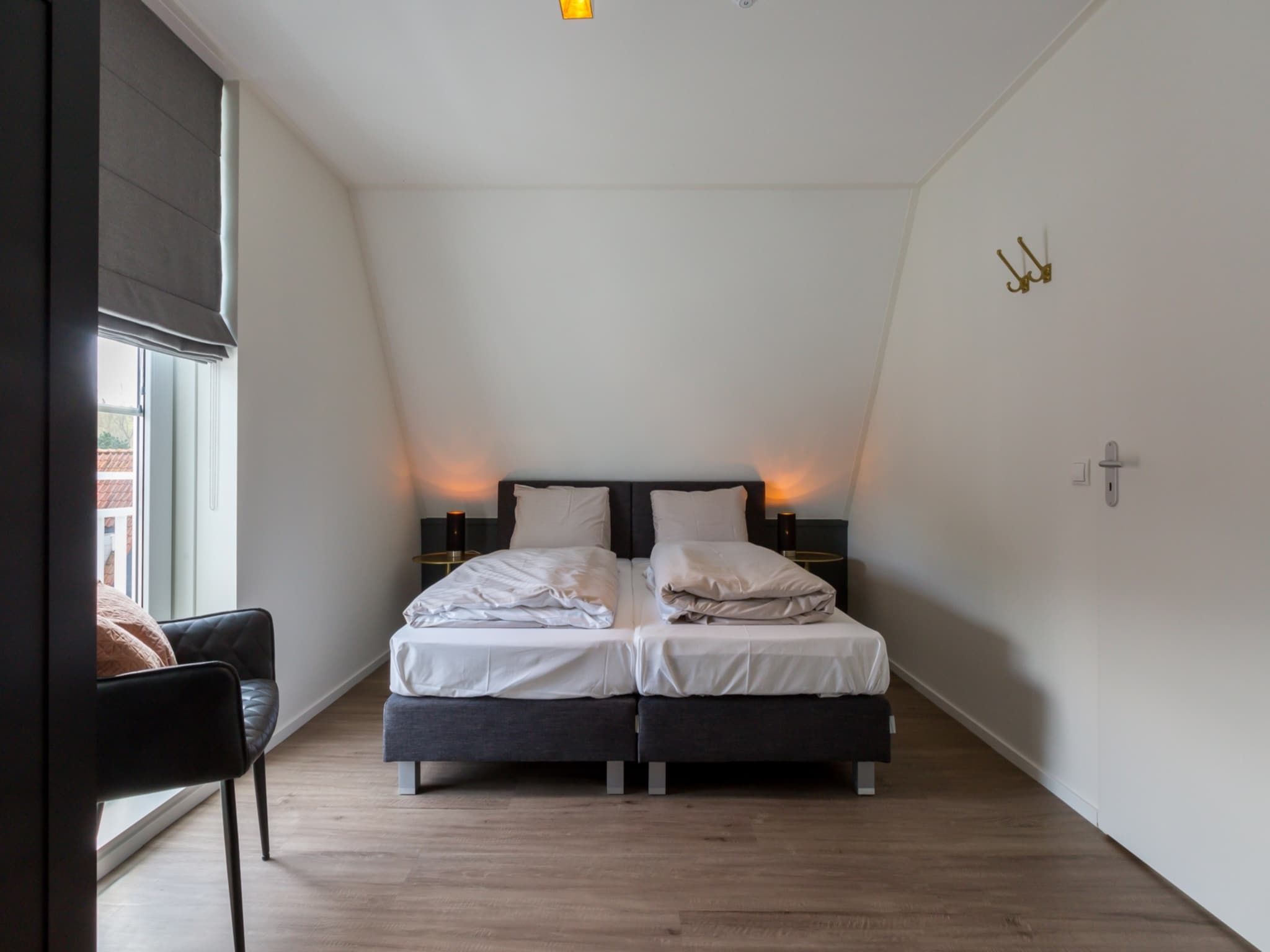 Een slaapkamer van Appartement Duinhof Dishoek 13F - 6 personen sauna in Koudekerke