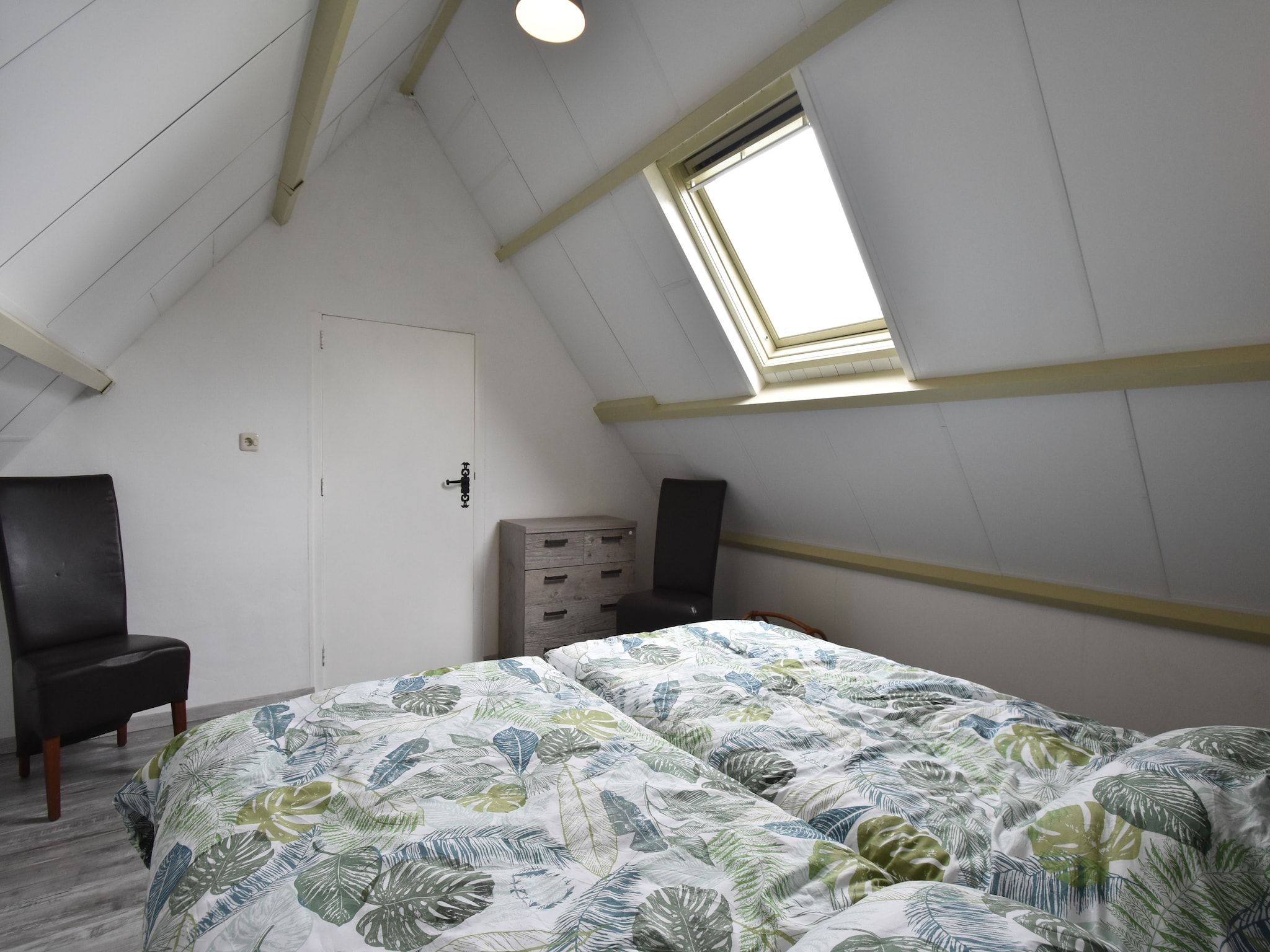 Een slaapkamer van Het Hoge Noorden in Hippolytushoef