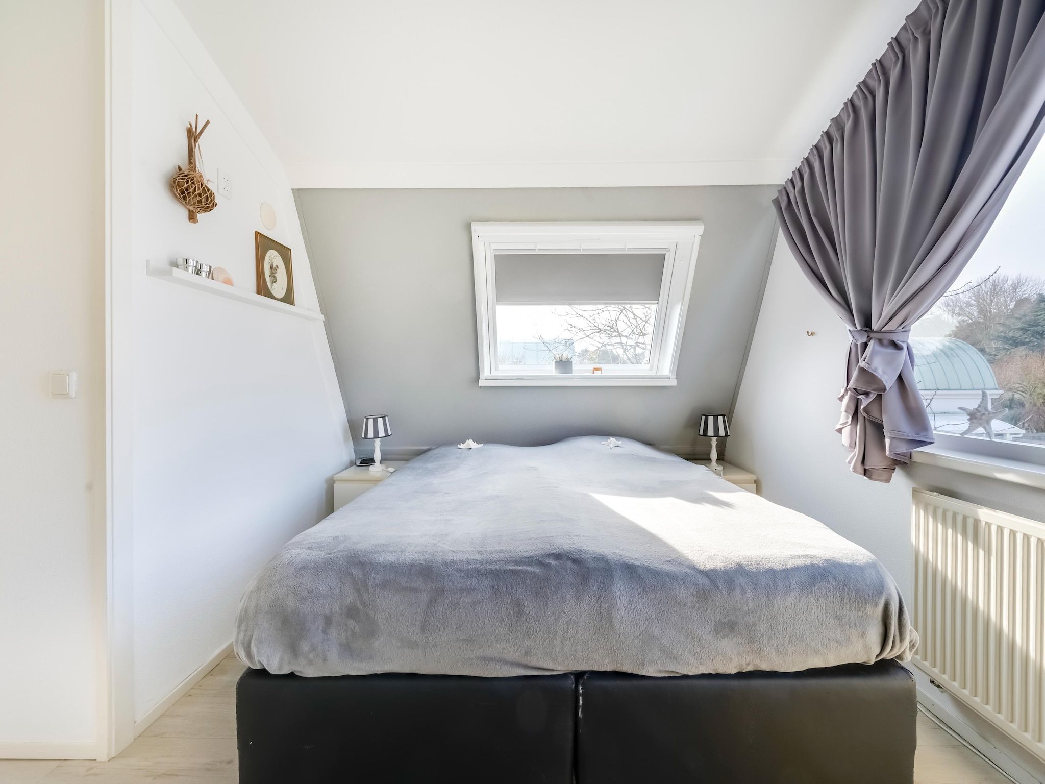 Een slaapkamer van De Zilvermeeuw in Noordwijk