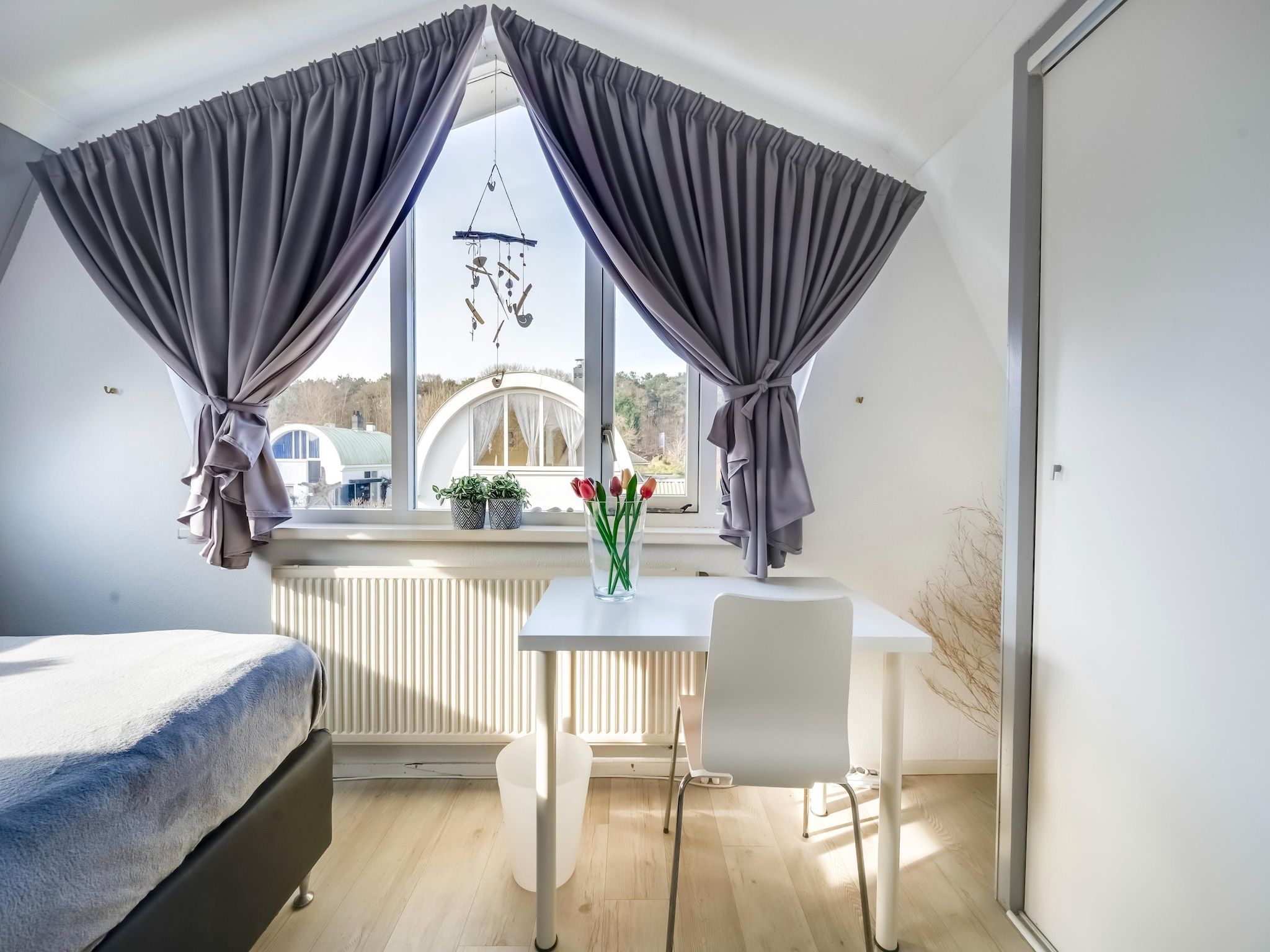 Een slaapkamer van De Zilvermeeuw in Noordwijk