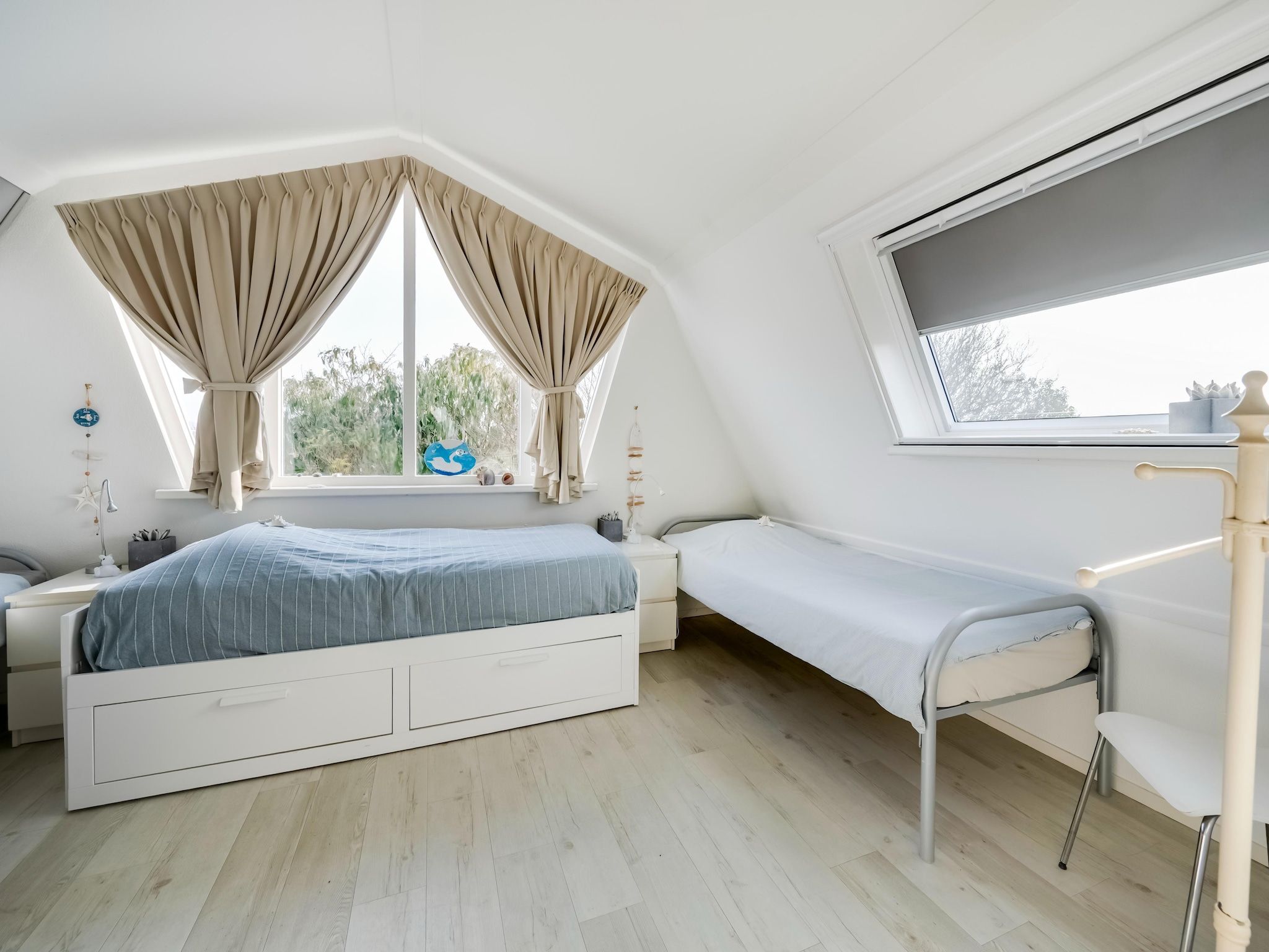 Een slaapkamer van De Zilvermeeuw in Noordwijk