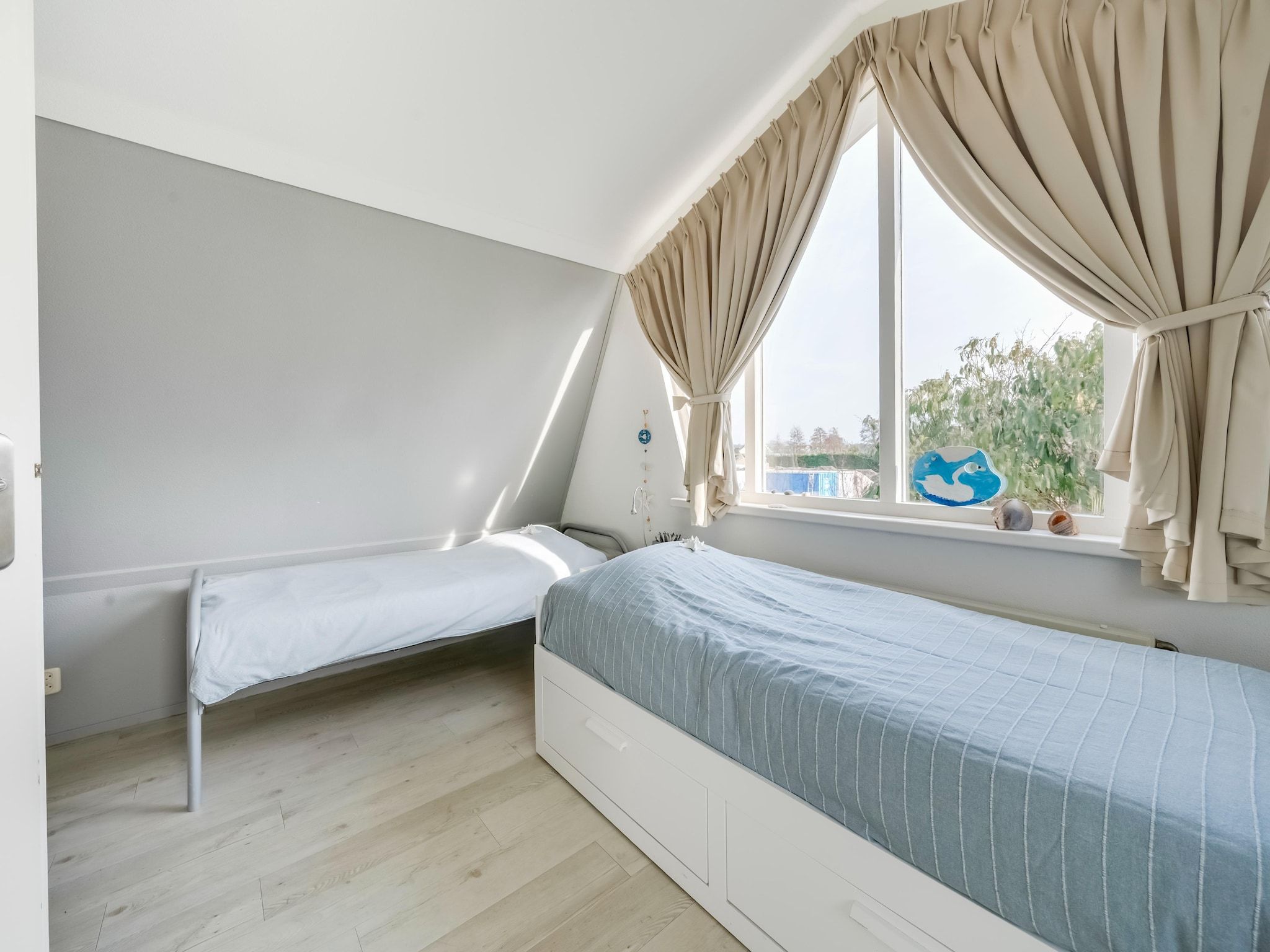 Een slaapkamer van De Zilvermeeuw in Noordwijk