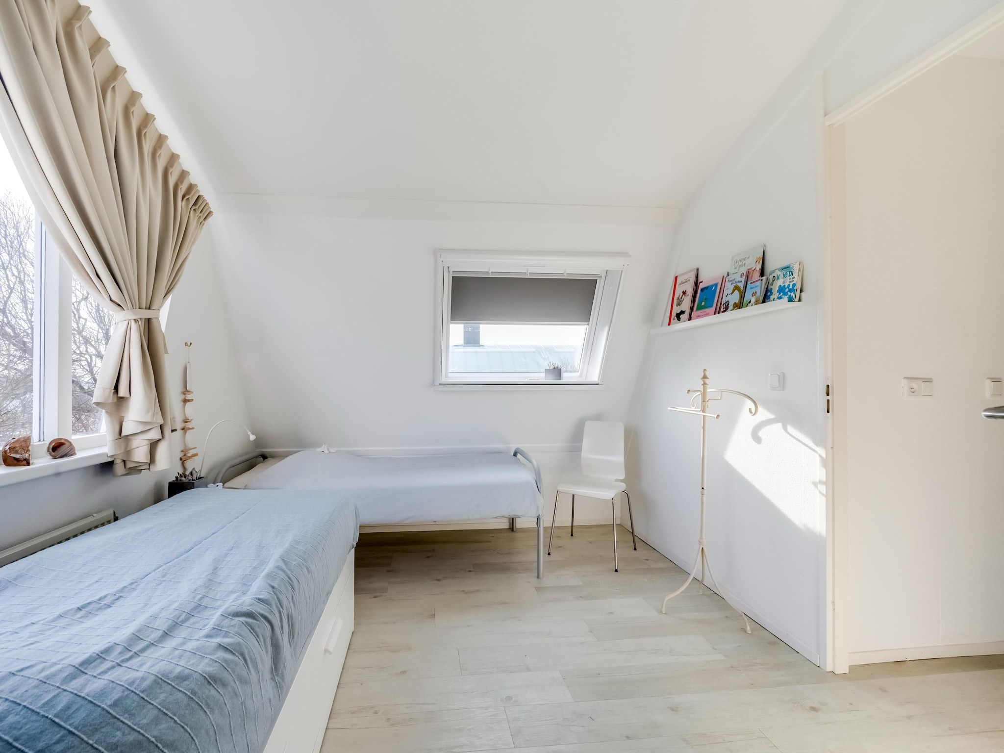 Een slaapkamer van De Zilvermeeuw in Noordwijk
