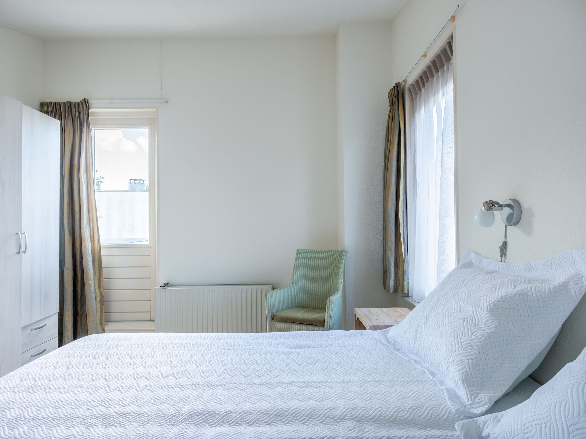 Een slaapkamer van Cardium 33 in Kamperland