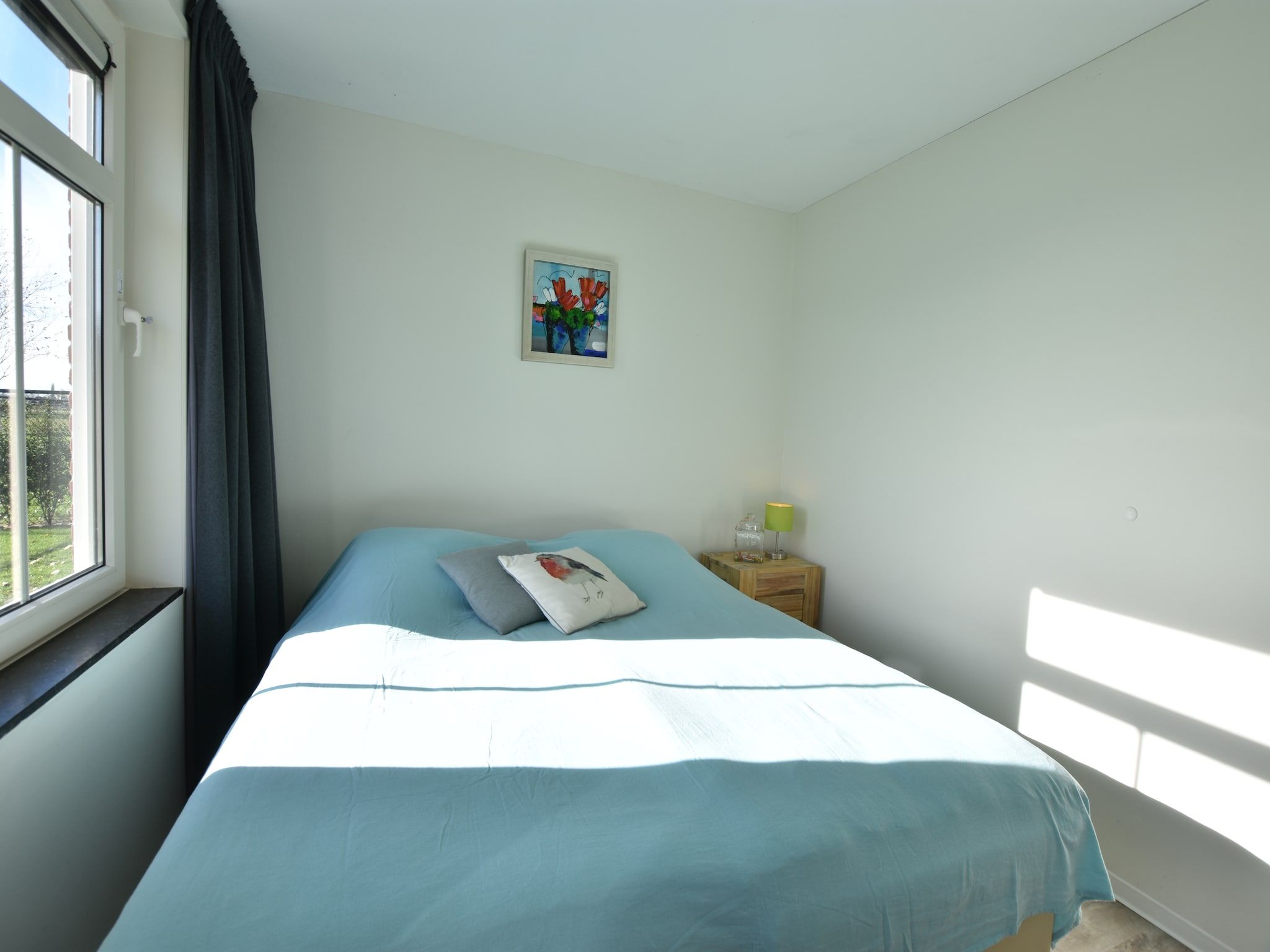 Een slaapkamer van Krokus 10 in Breskens