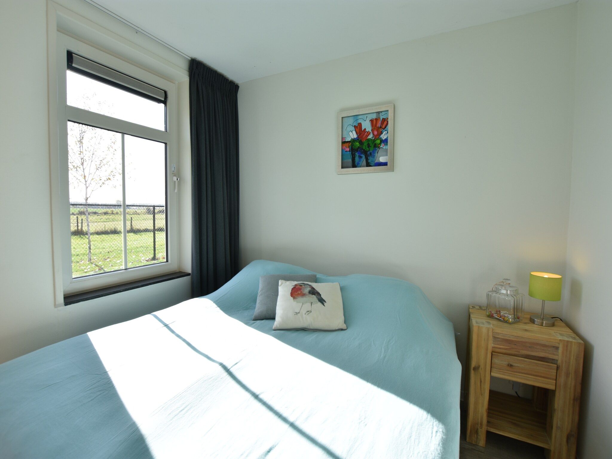 Een slaapkamer van Krokus 10 in Breskens