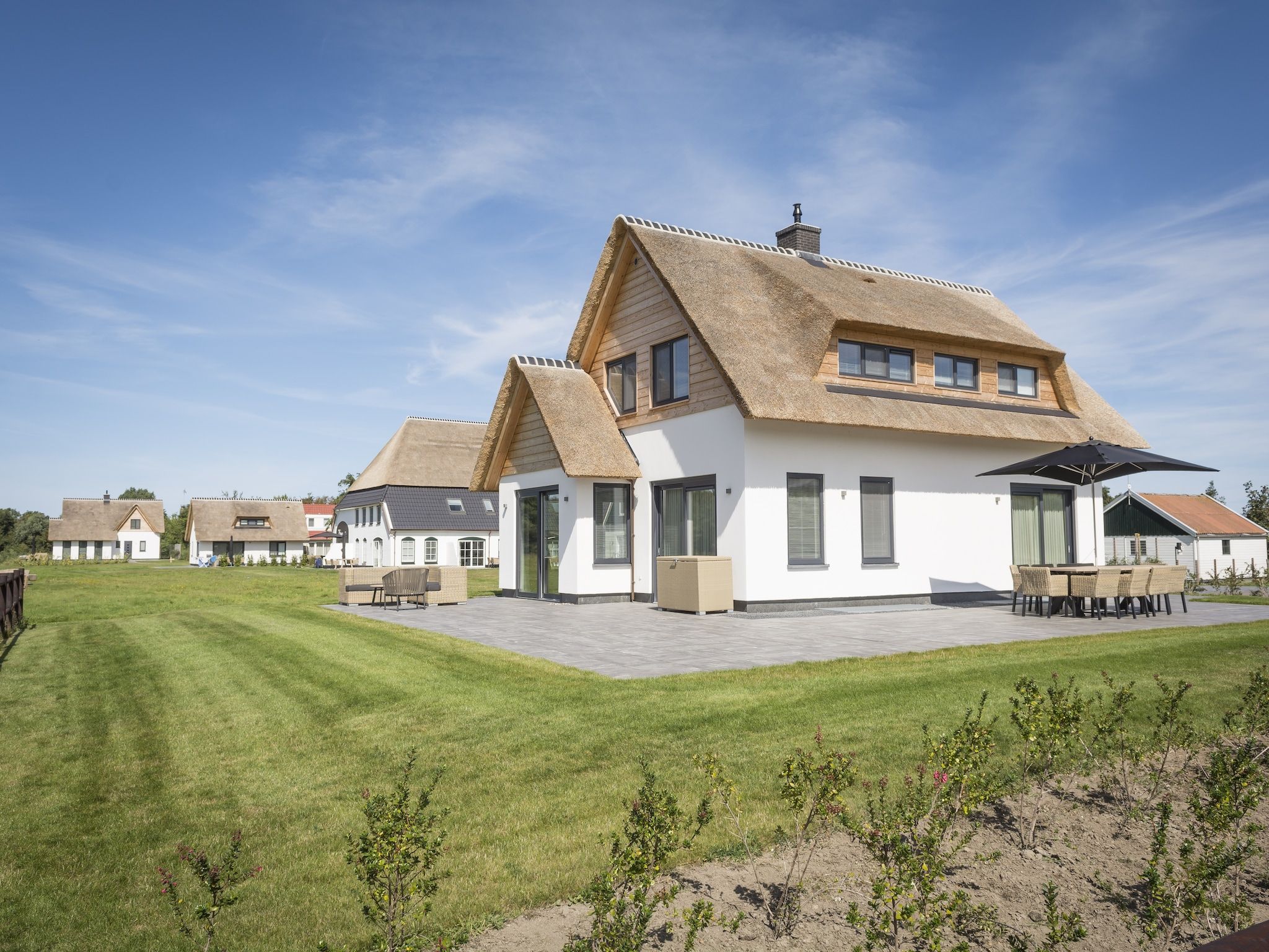De buitenkant van Villa Bouwlust F Wellness in De Cocksdorp Texel