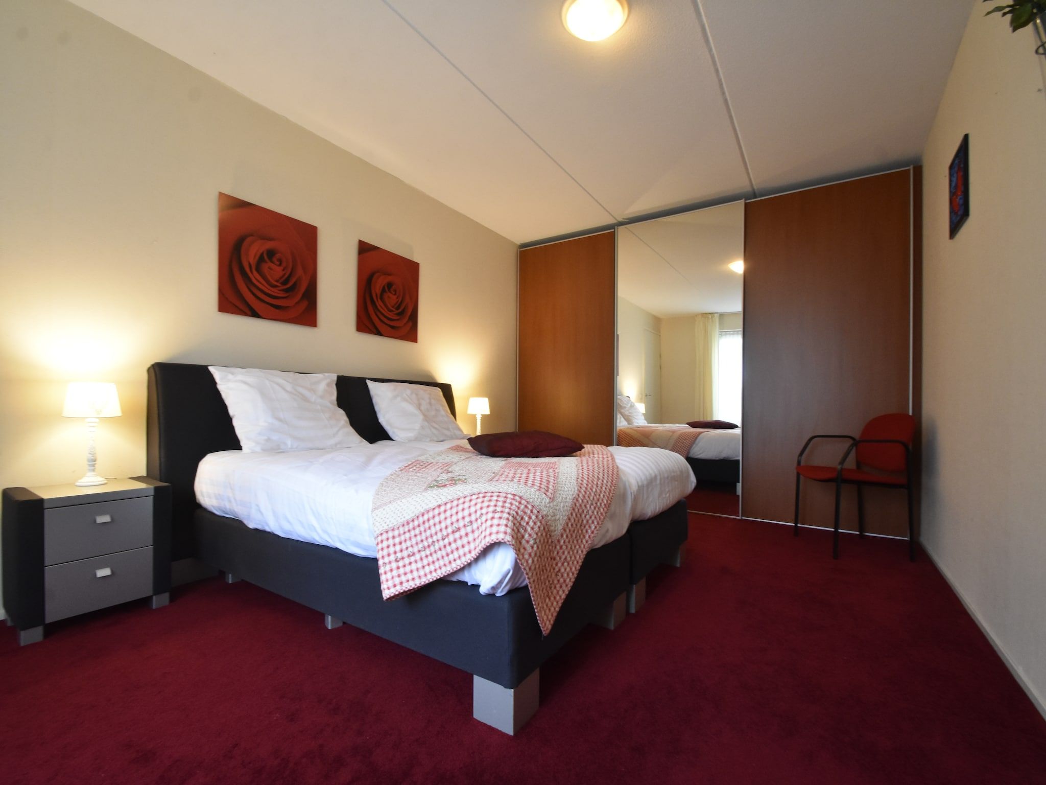 Een slaapkamer van Bosruiter in Zeewolde