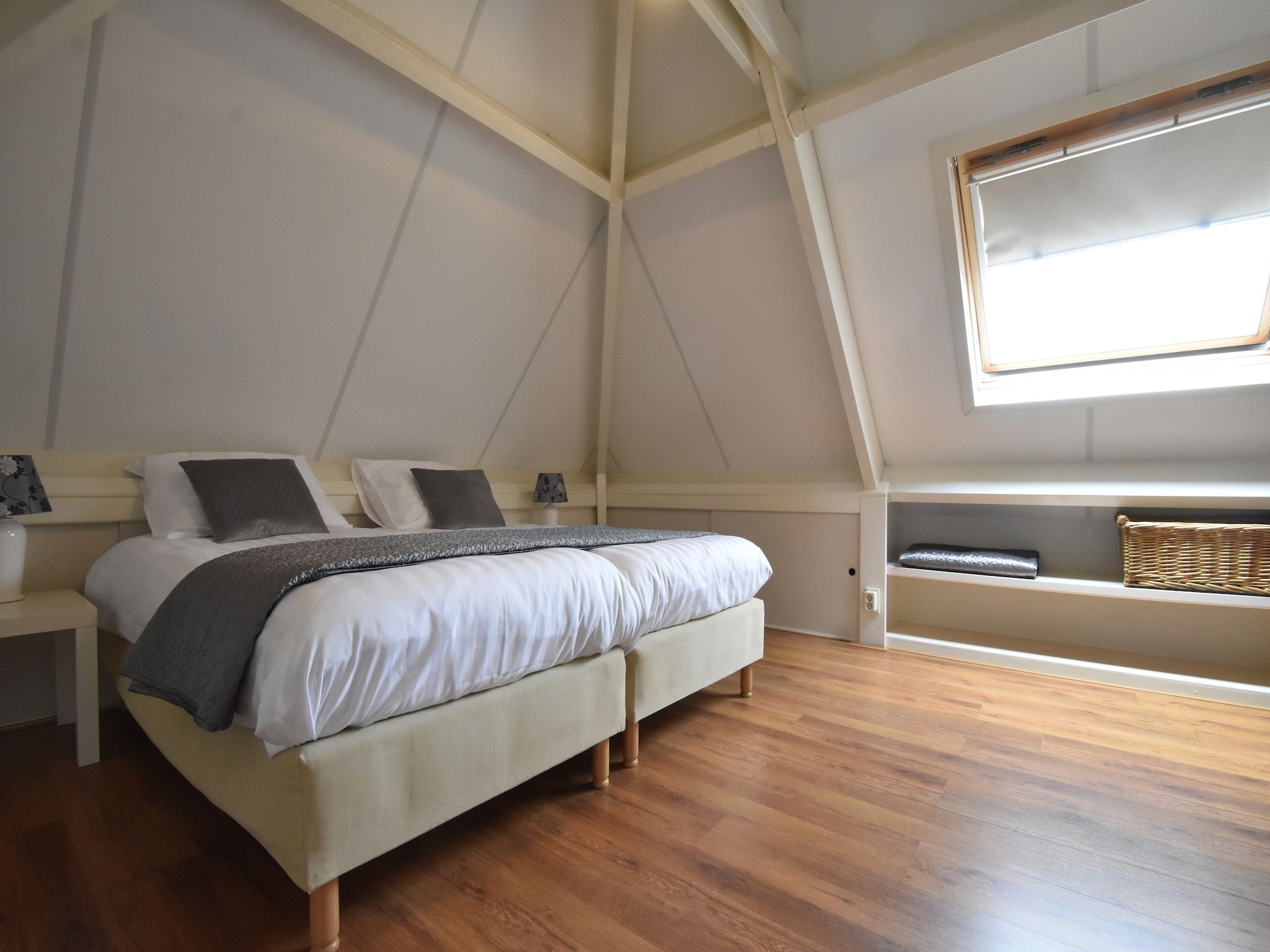 Een slaapkamer van Bosruiter in Zeewolde