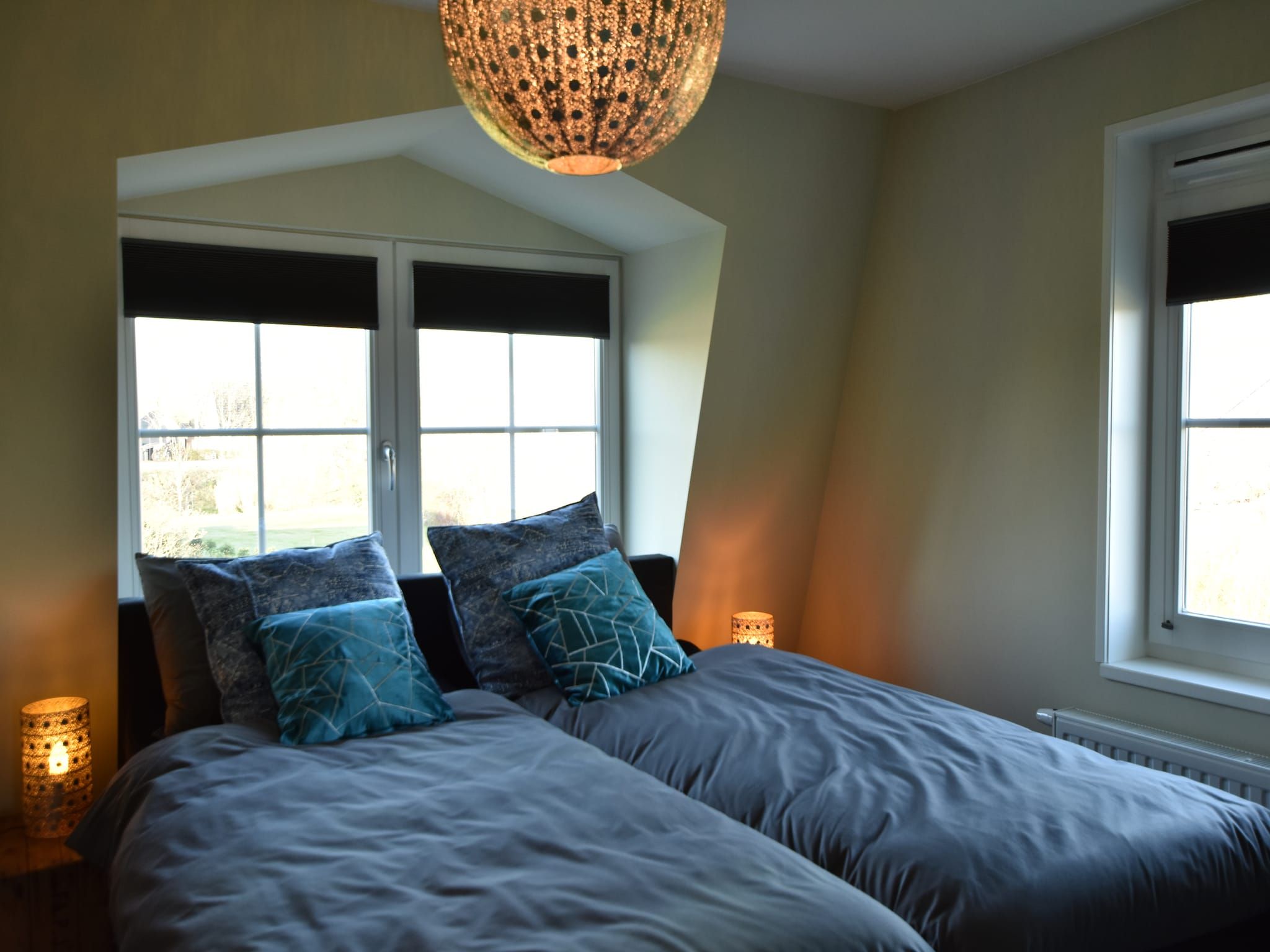 Een slaapkamer van Scoreldame 6-persoons in Schoorldam