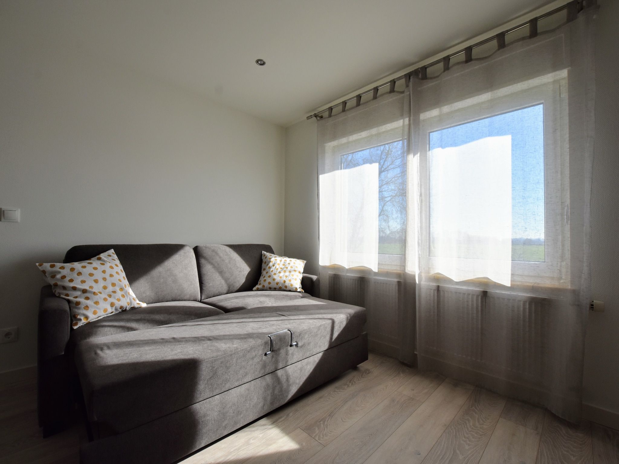 Een slaapkamer van Villa Grenszicht in Megchelen