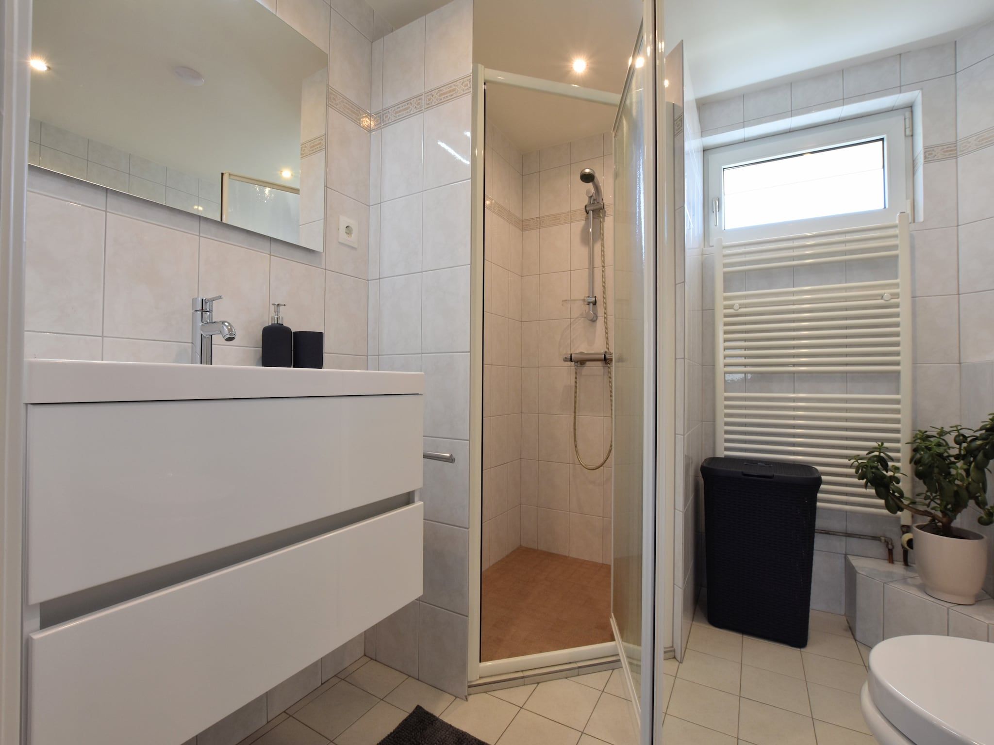 De badkamer van Villa Grenszicht in Megchelen