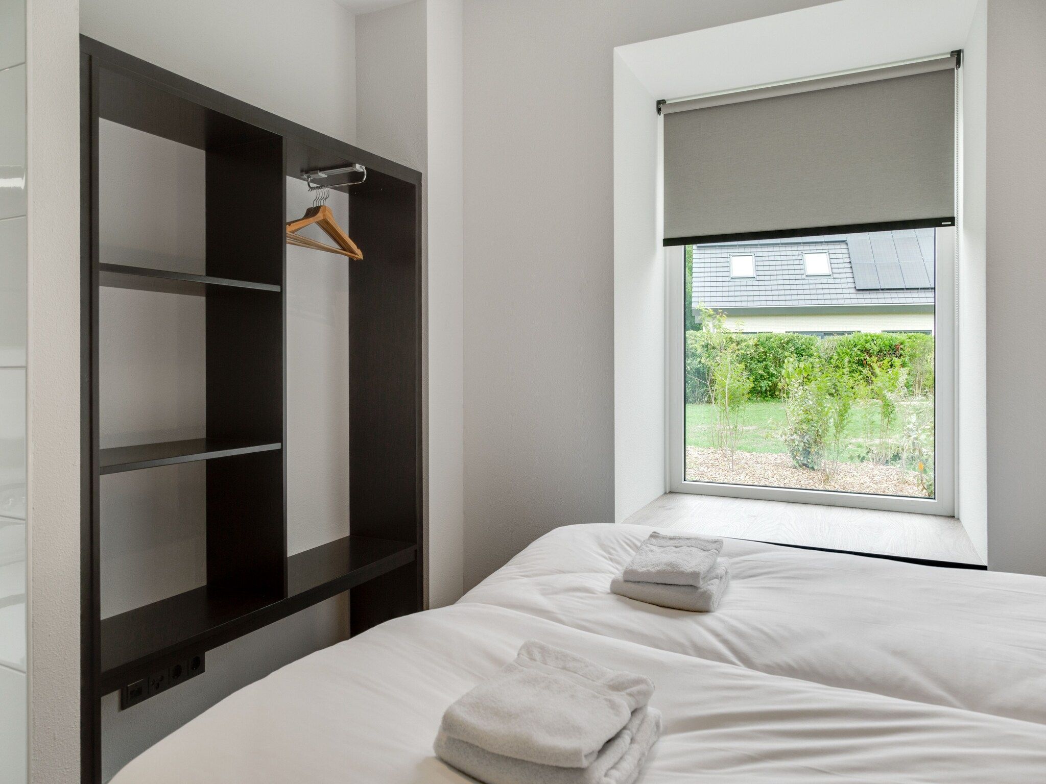 Een slaapkamer van De Koog nr 1 - 6 pers woning de luxe in De Koog Texel
