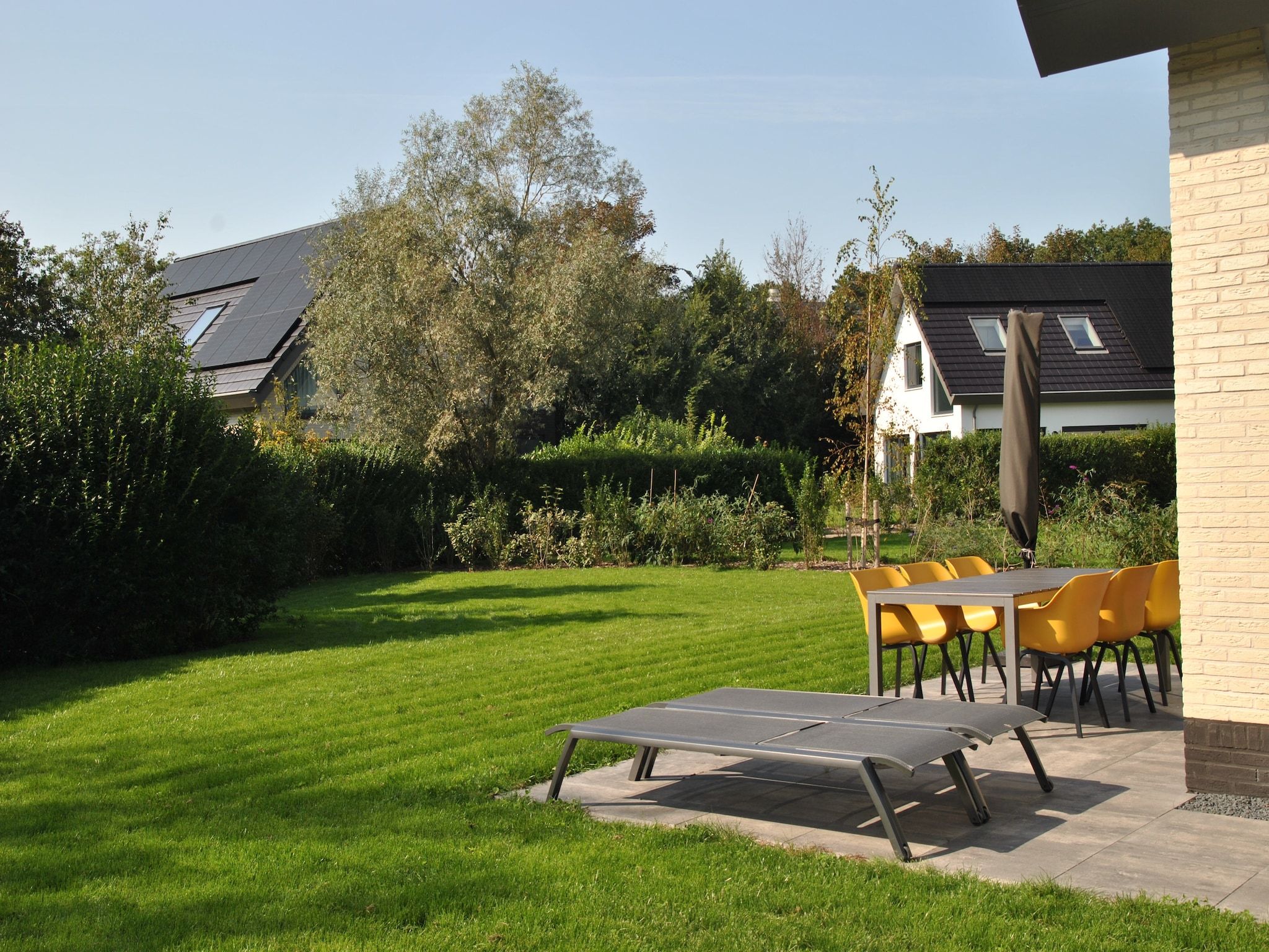 De tuin van De Koog nr 1 - 6 pers woning de luxe in De Koog Texel