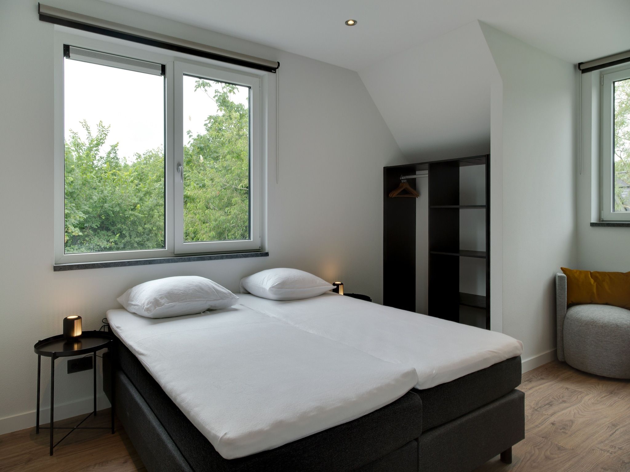Een slaapkamer van De Koog nr 6 tm 10- 6 pers woning de luxe in De Koog Texel