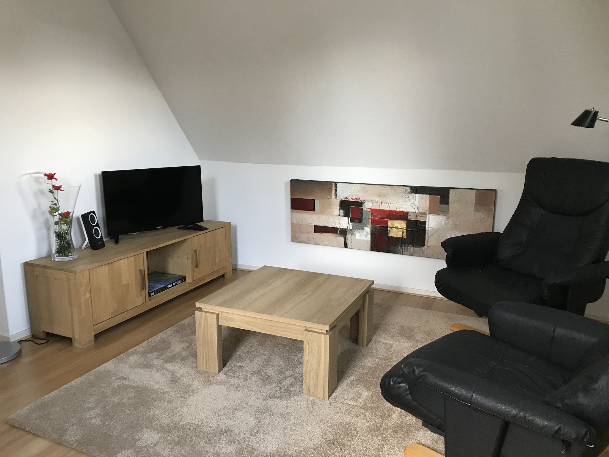 De woonkamer van Vakantie appartement De Stelling in Noordwolde
