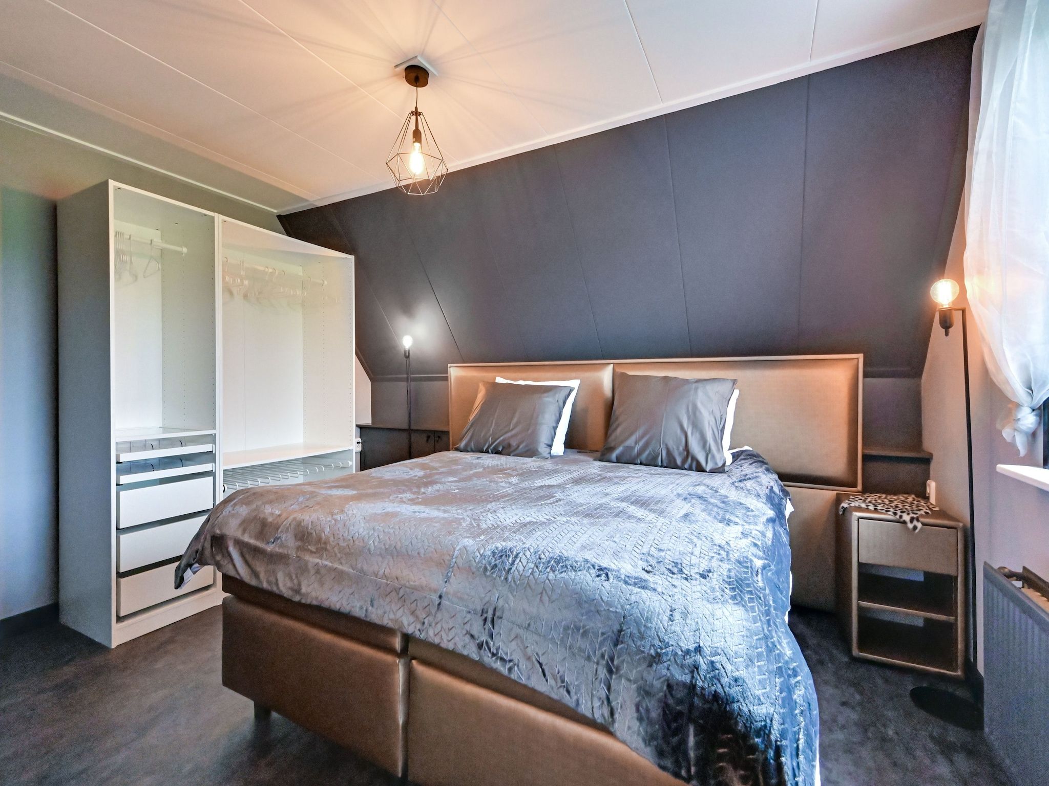 Een slaapkamer van Villa Didam in Didam