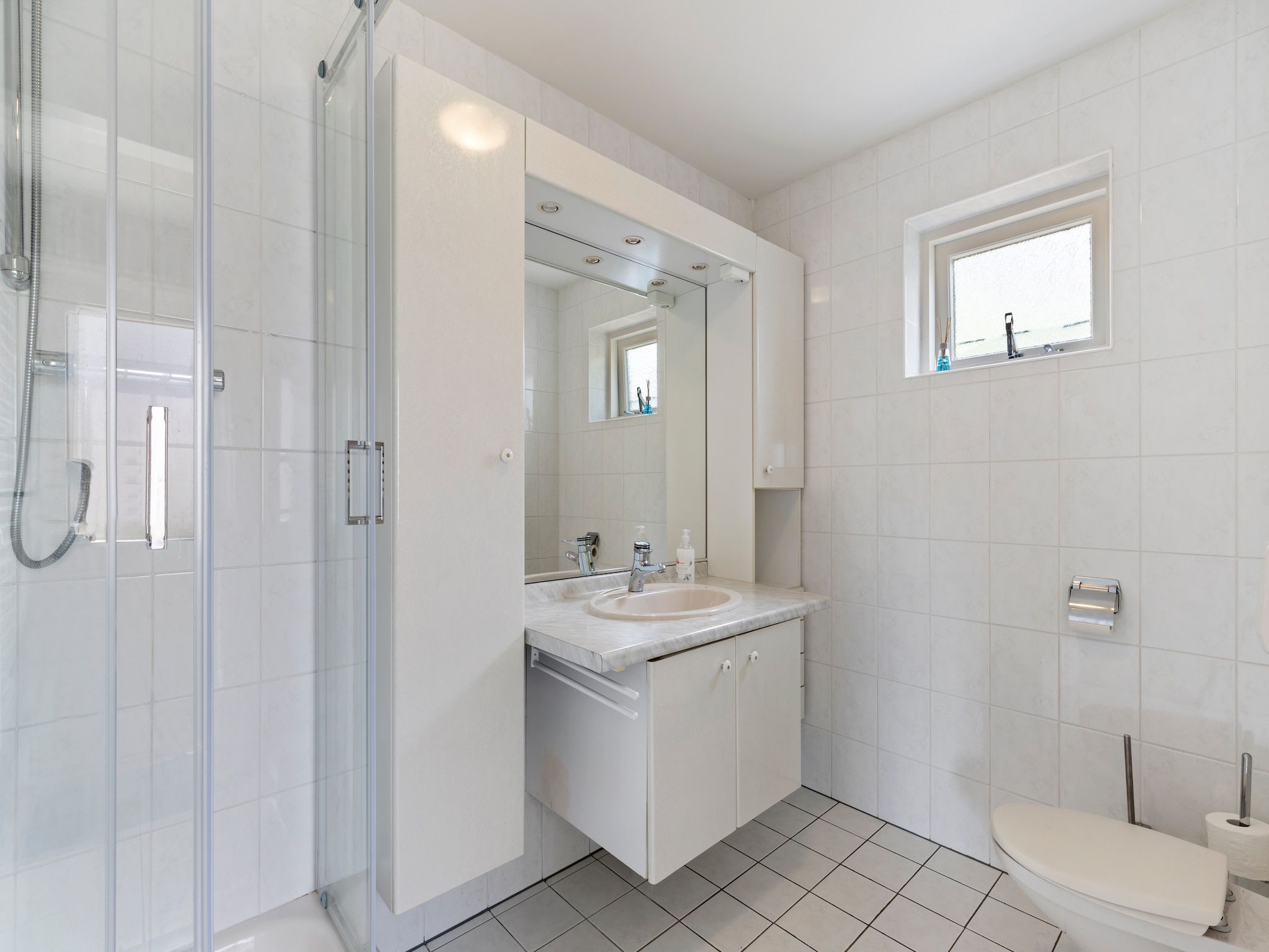 De badkamer van Huisje Putten in Putten