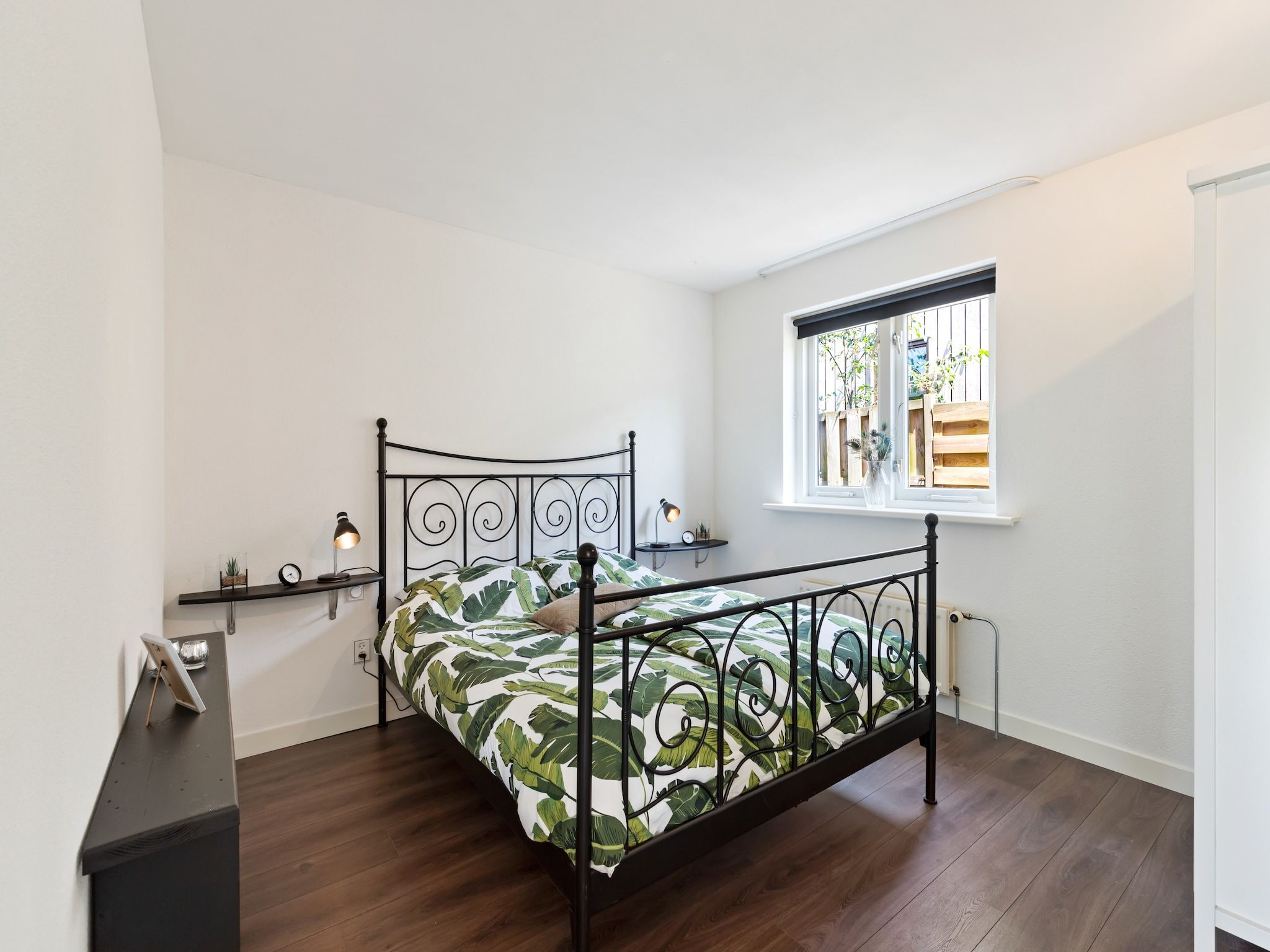 Een slaapkamer van Huisje Putten in Putten