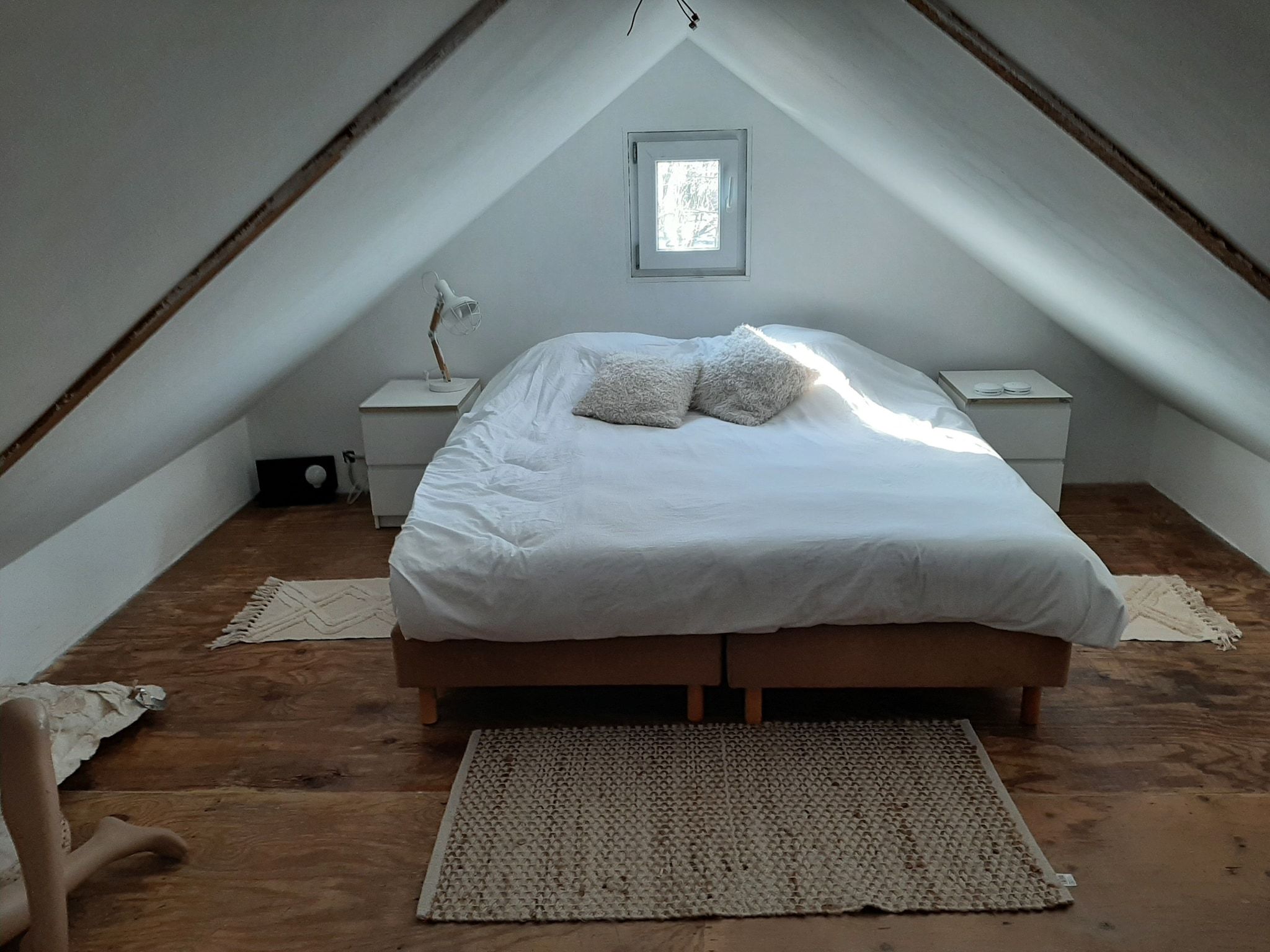 Een slaapkamer van Vakantiehuis 'Het Atelier' in Sleen