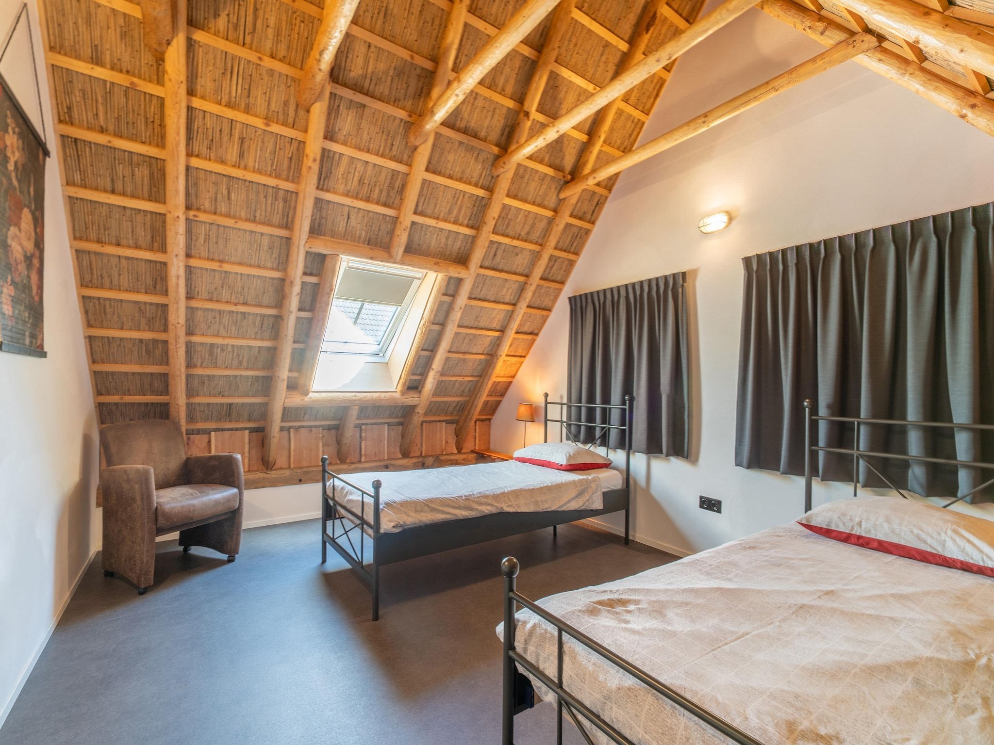 Een slaapkamer van woonboerderij in Staphorst voor 6 personen in Rouveen