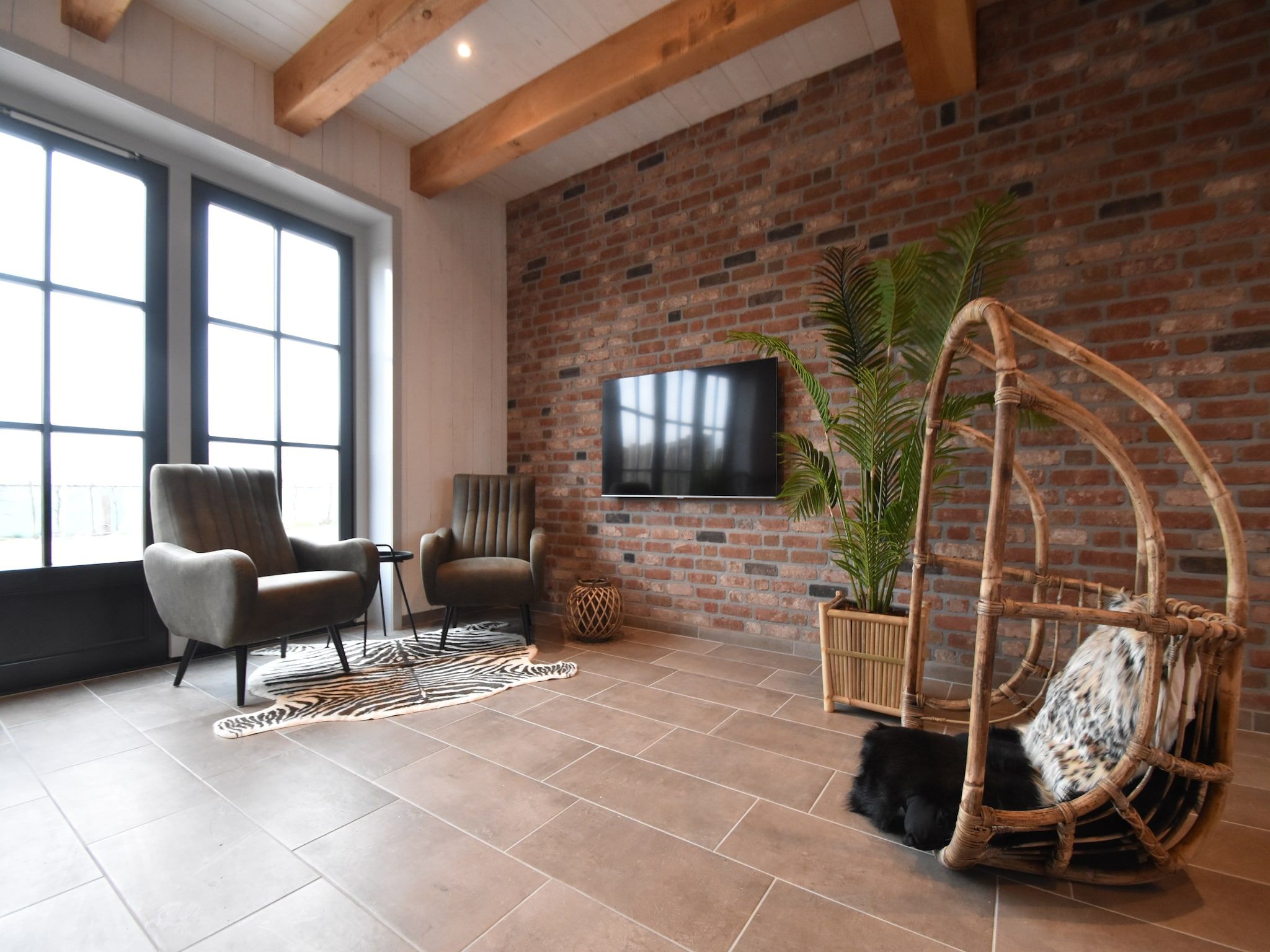 De woonkamer van Hazenborgh - Duinhuis 1 in Callantsoog