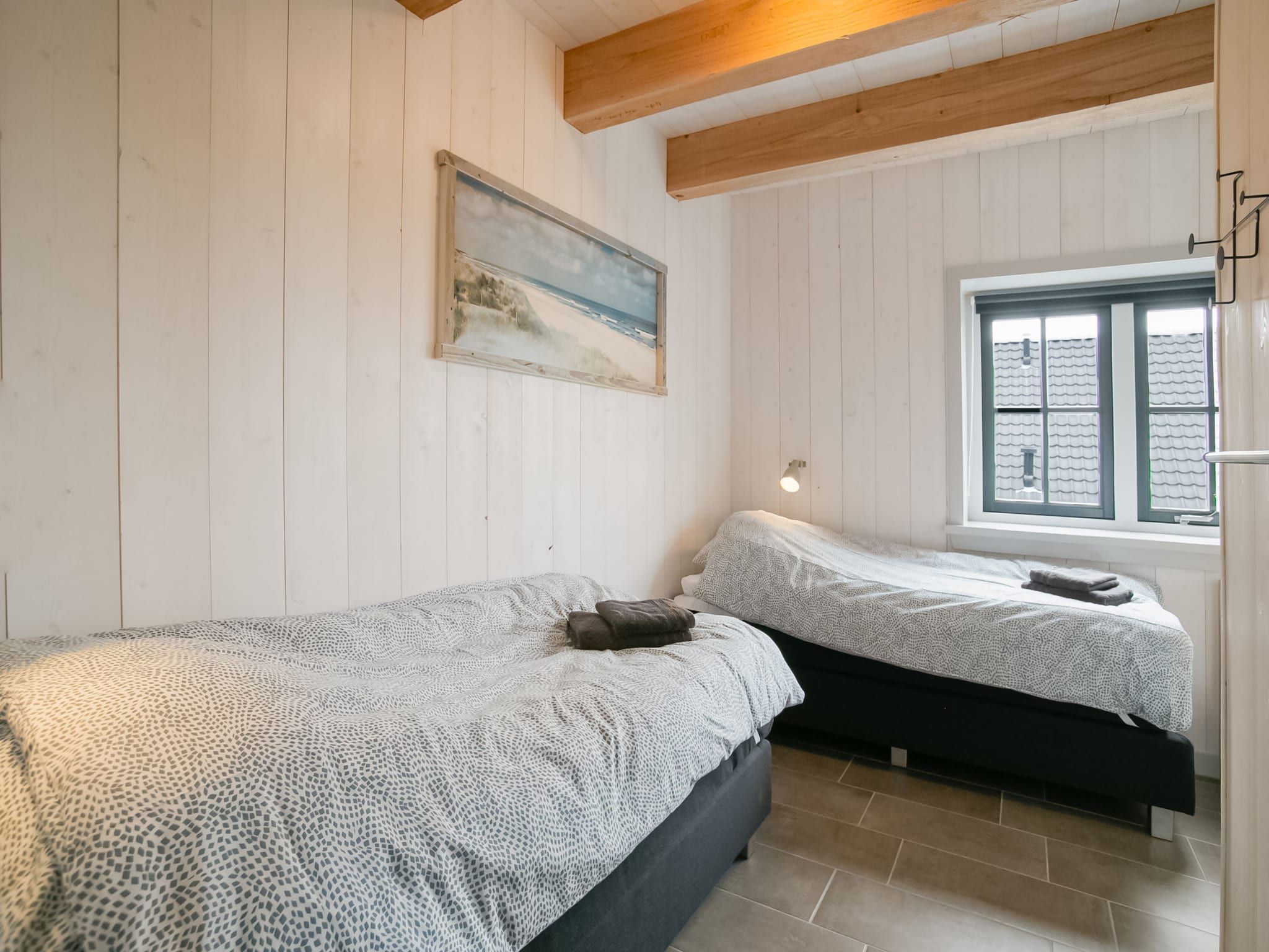 Een slaapkamer van Hazenborgh - Duinhuis 1 in Callantsoog