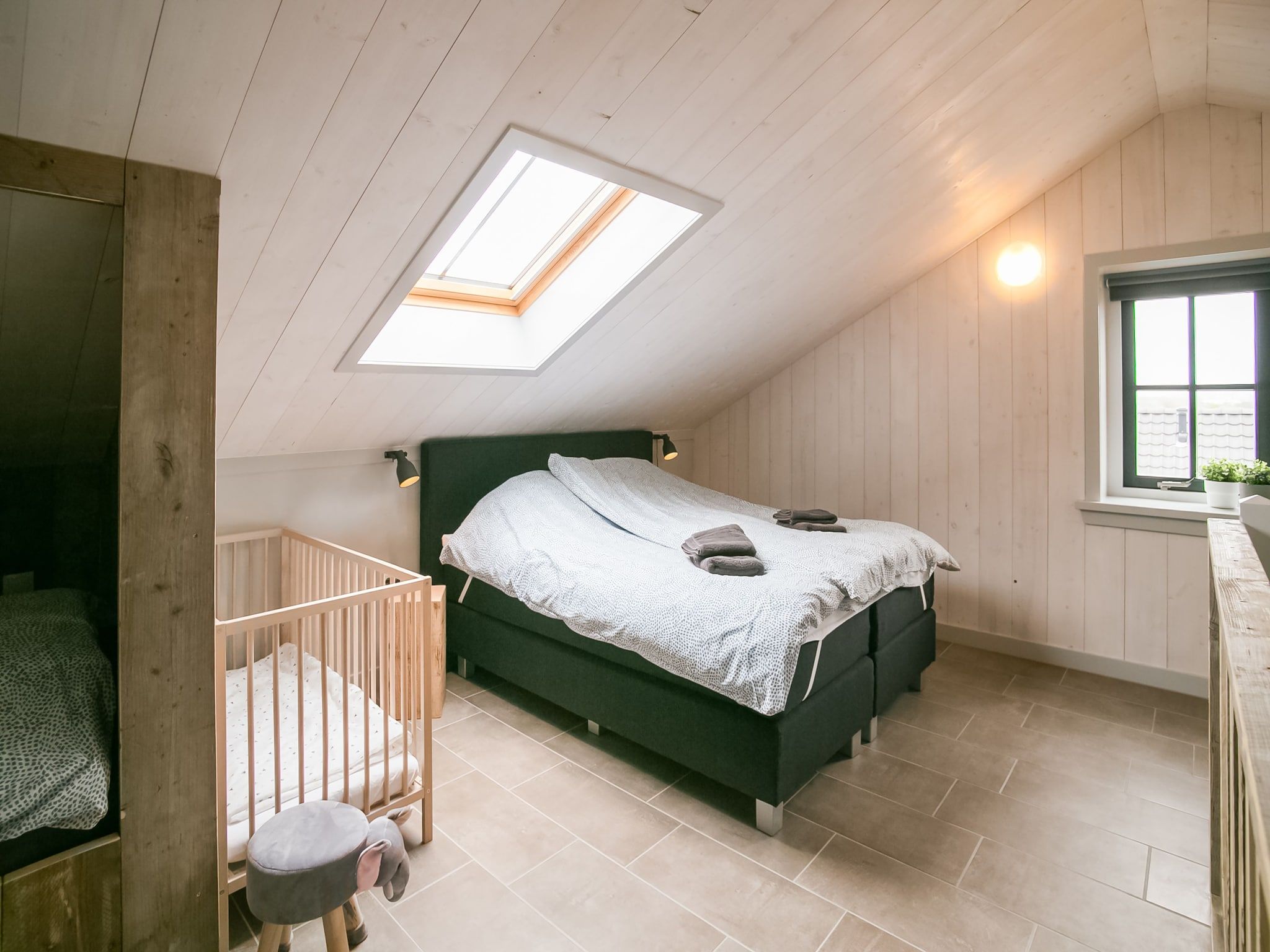 Een slaapkamer van Hazenborgh - Duinhuis 1 in Callantsoog