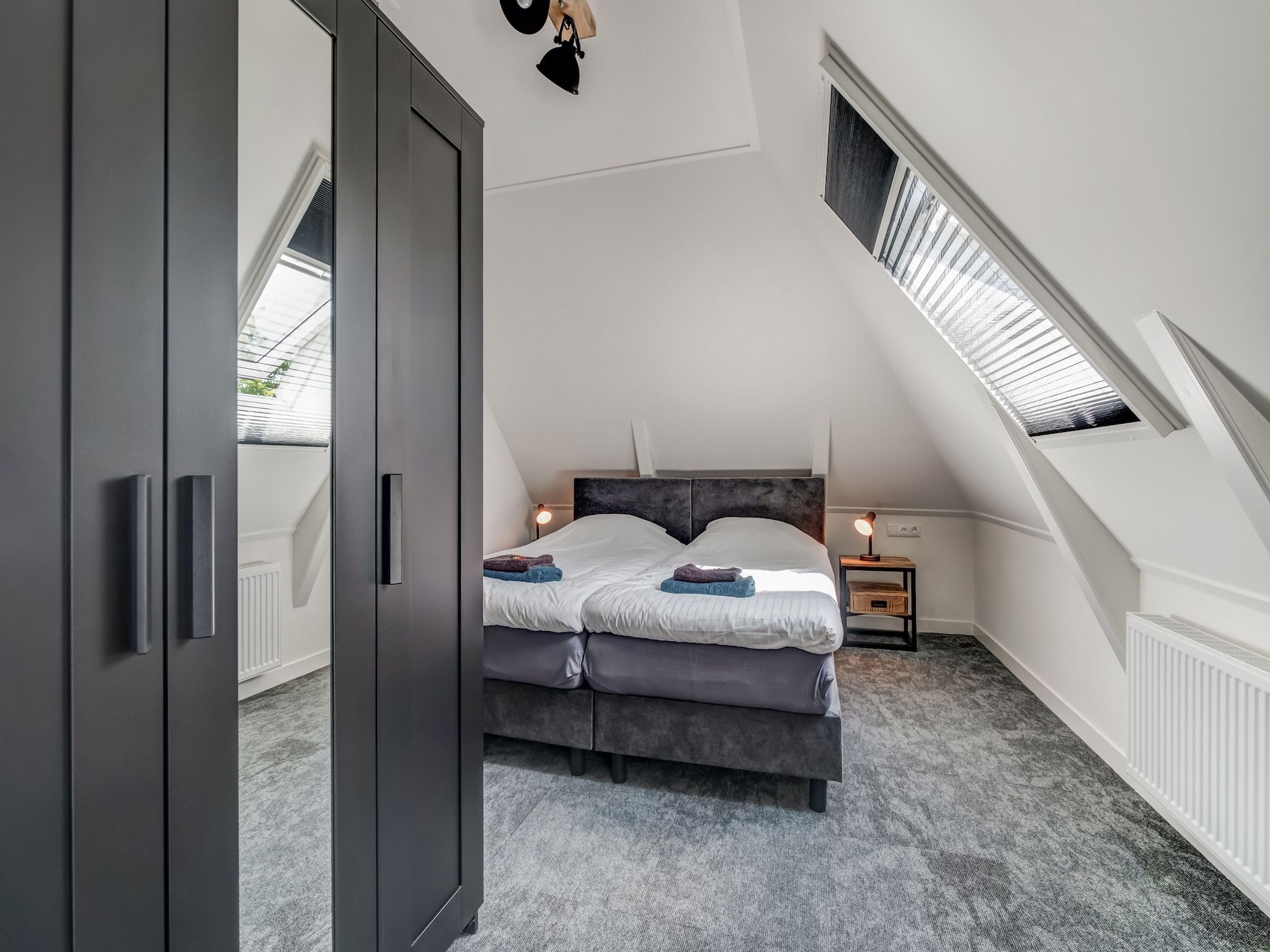 Een slaapkamer van Boerderij Koatstertille in Friesland