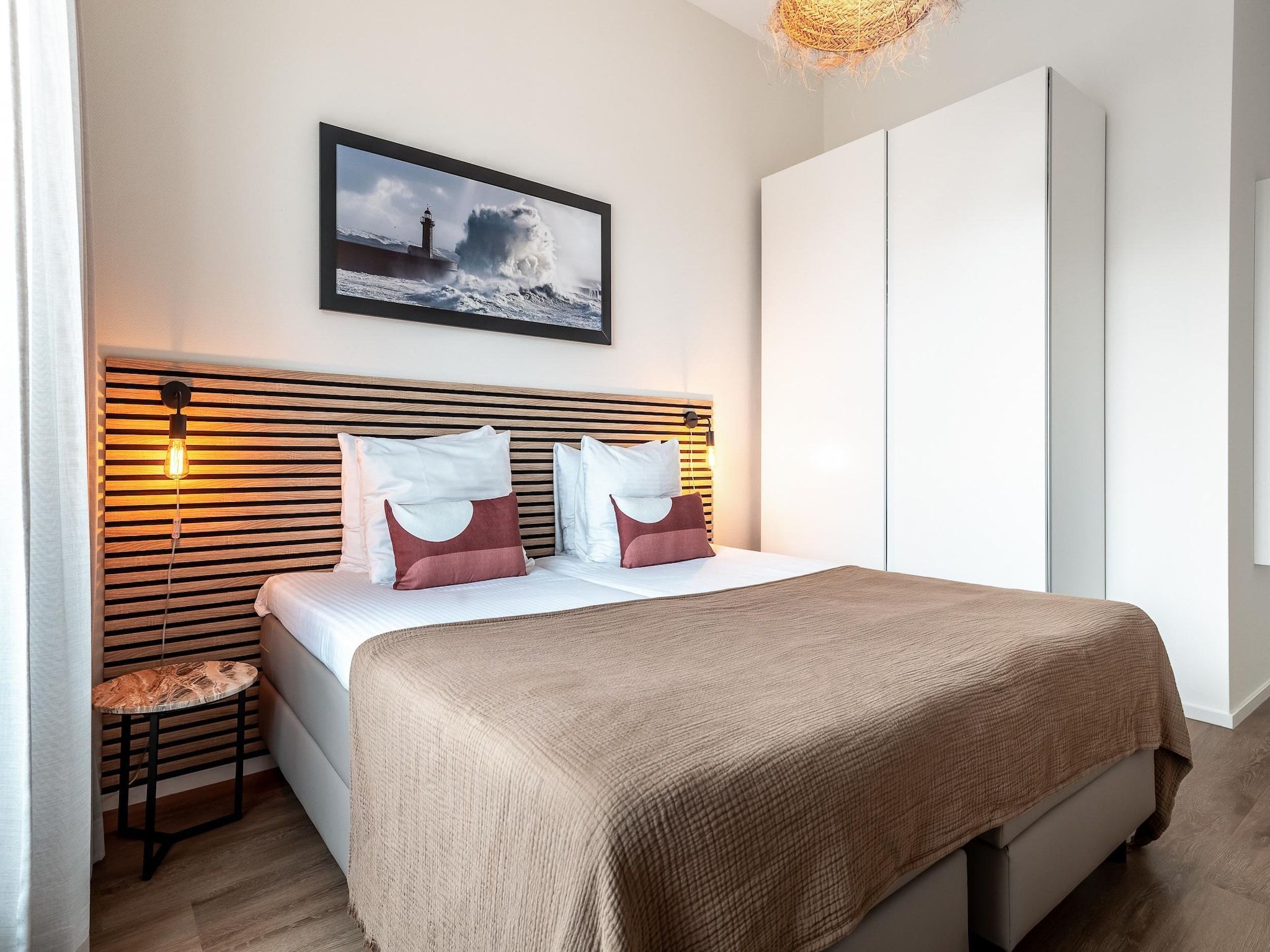 Een slaapkamer van Scheveningen Harbour 56 in Den Haag