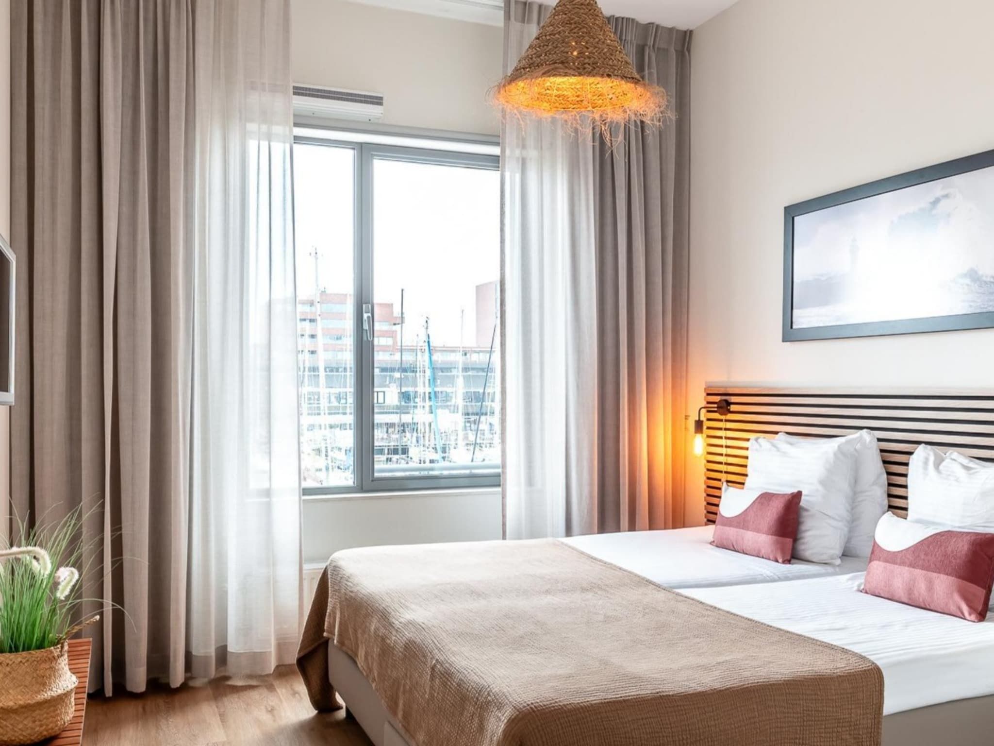 Een slaapkamer van Scheveningen Harbour 56 in Den Haag