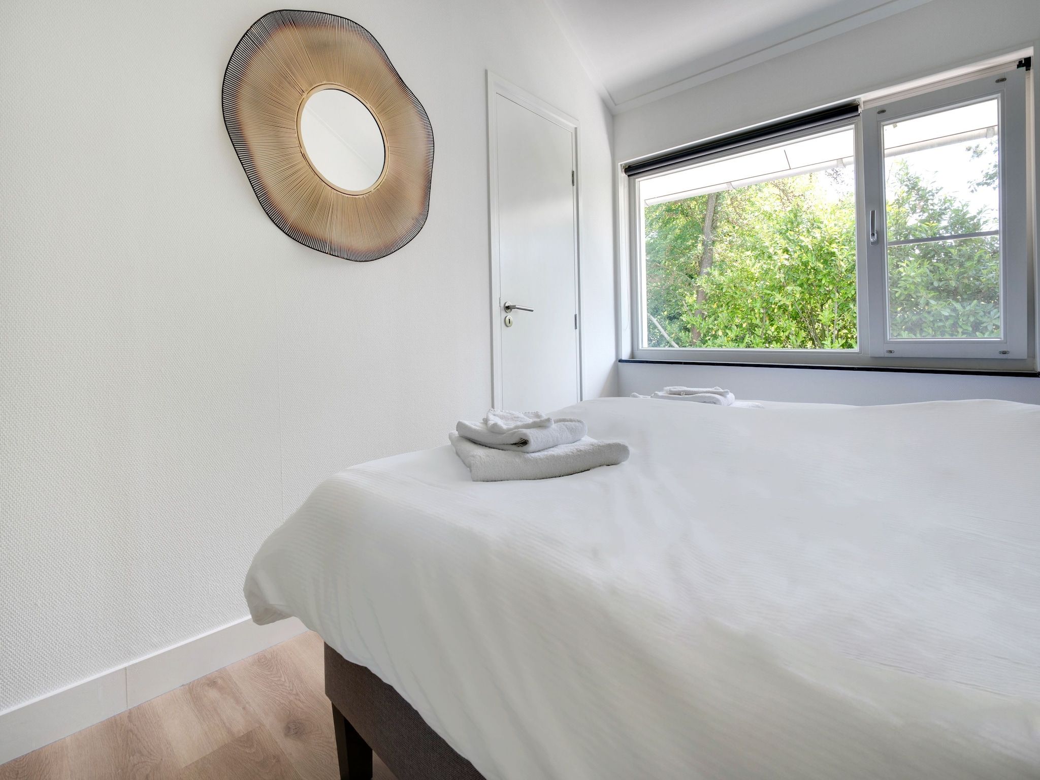 Een slaapkamer van Stijlvol familiehuis in Grou in Grou