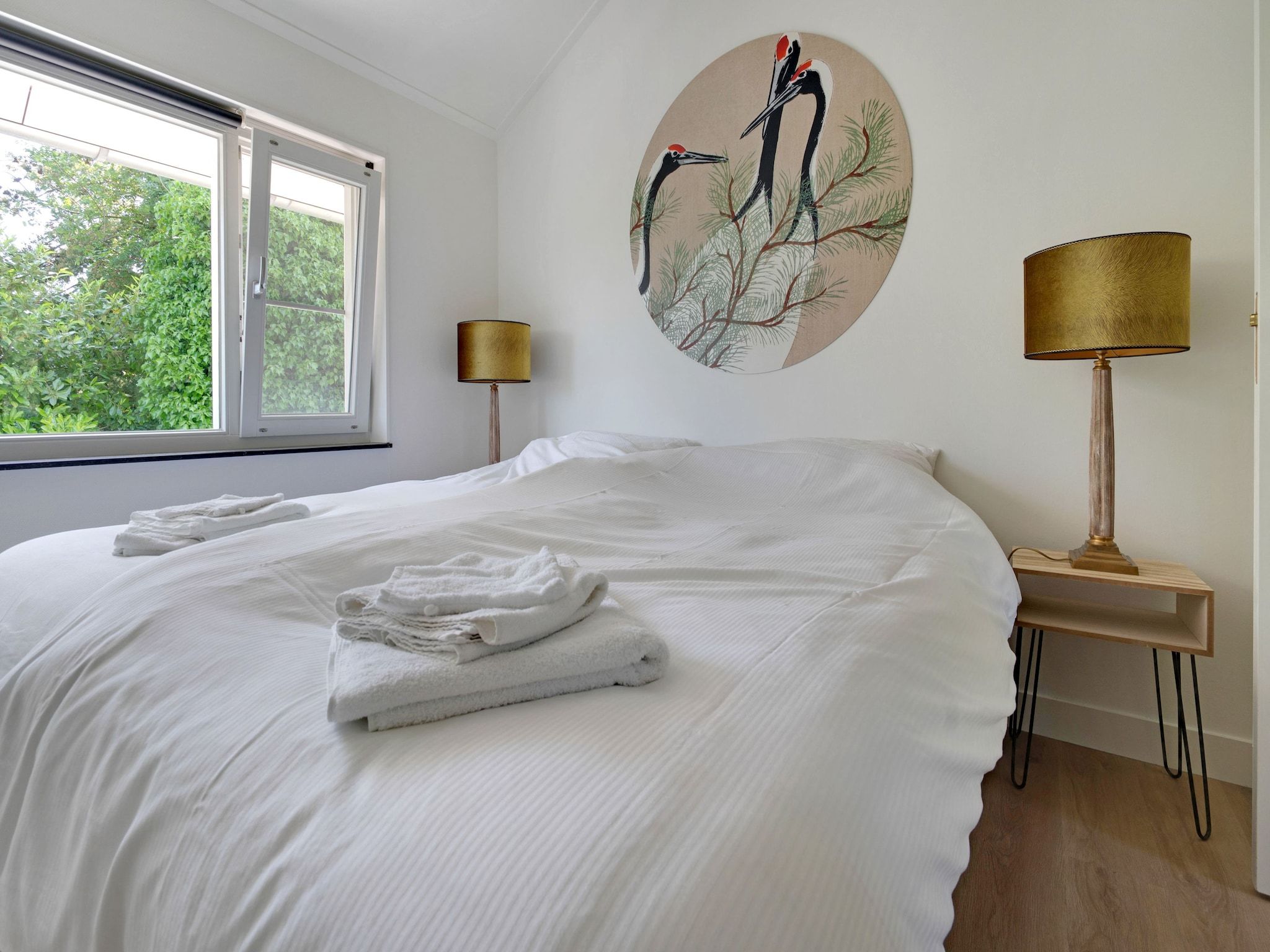 Een slaapkamer van Stijlvol familiehuis in Grou in Grou