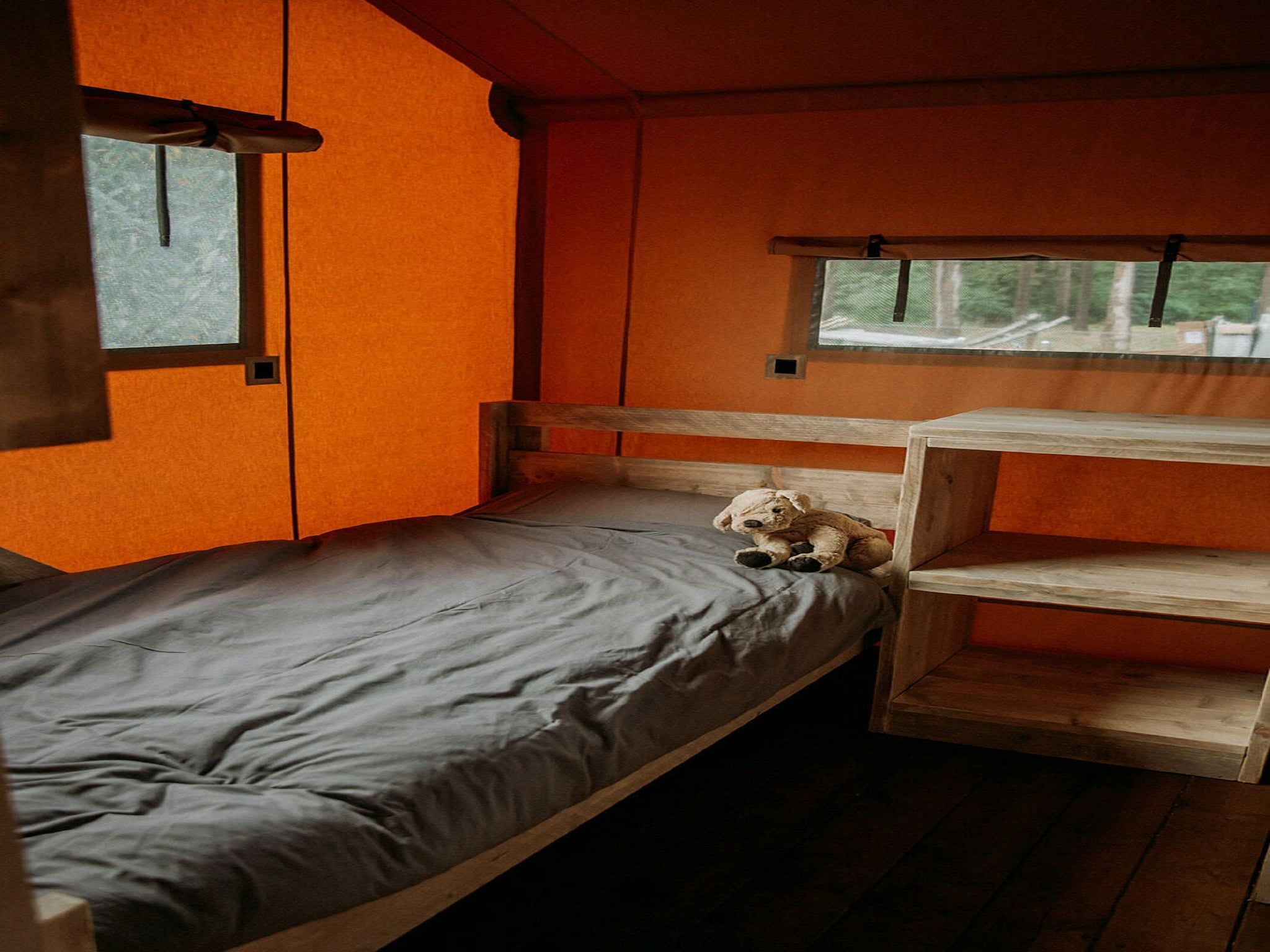 Een slaapkamer van Vakantiepark Mölke 33 in Zuna
