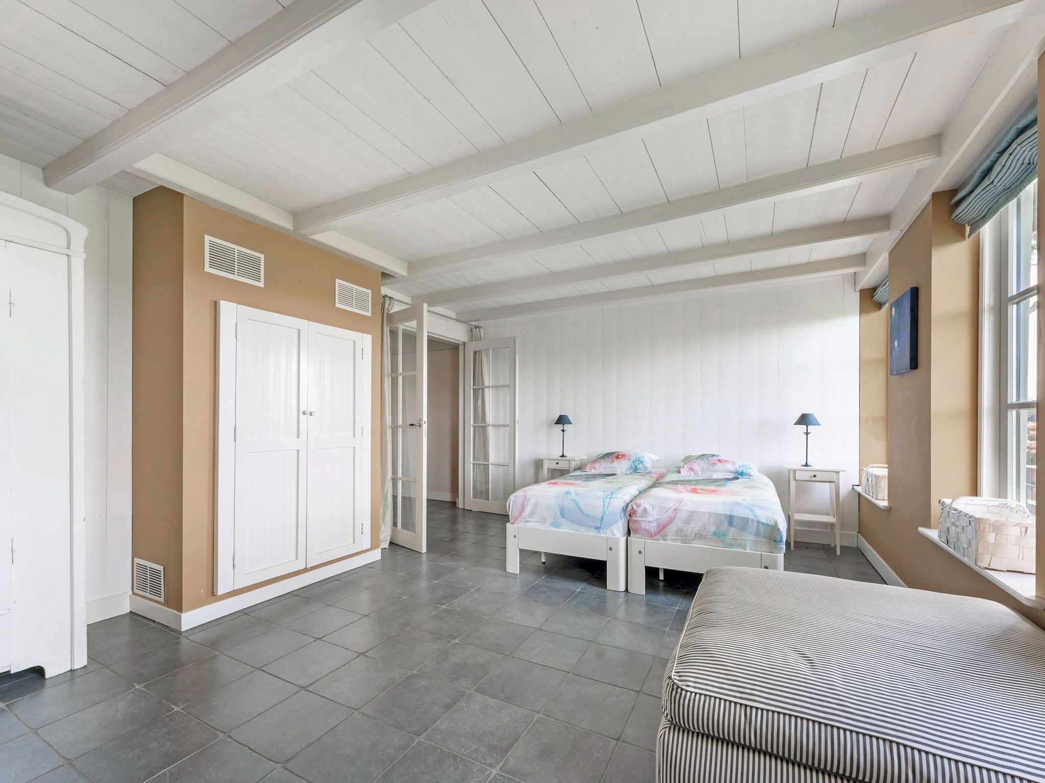 Een slaapkamer van De Pauwenhof in Heiloo