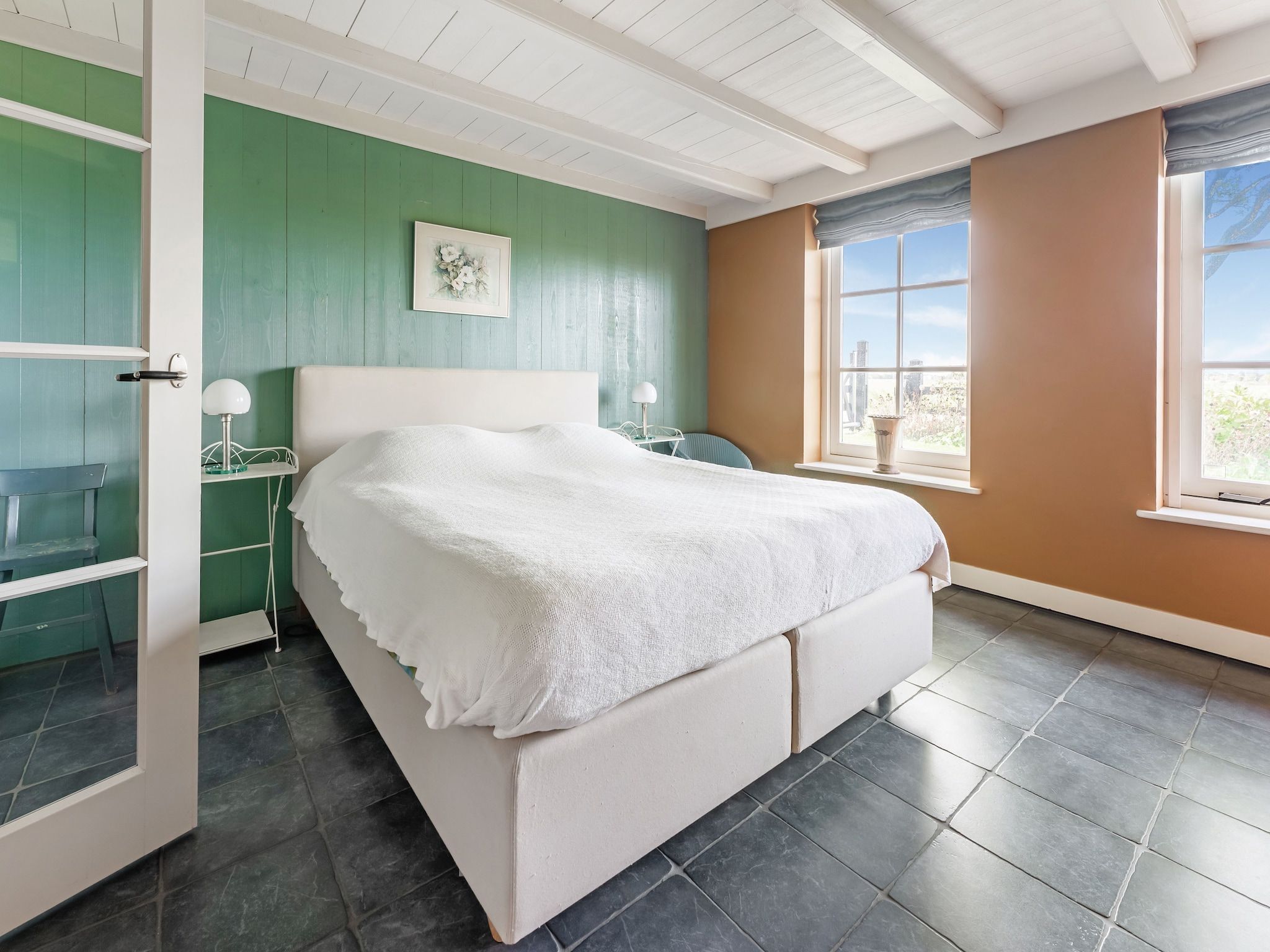 Een slaapkamer van De Pauwenhof in Heiloo