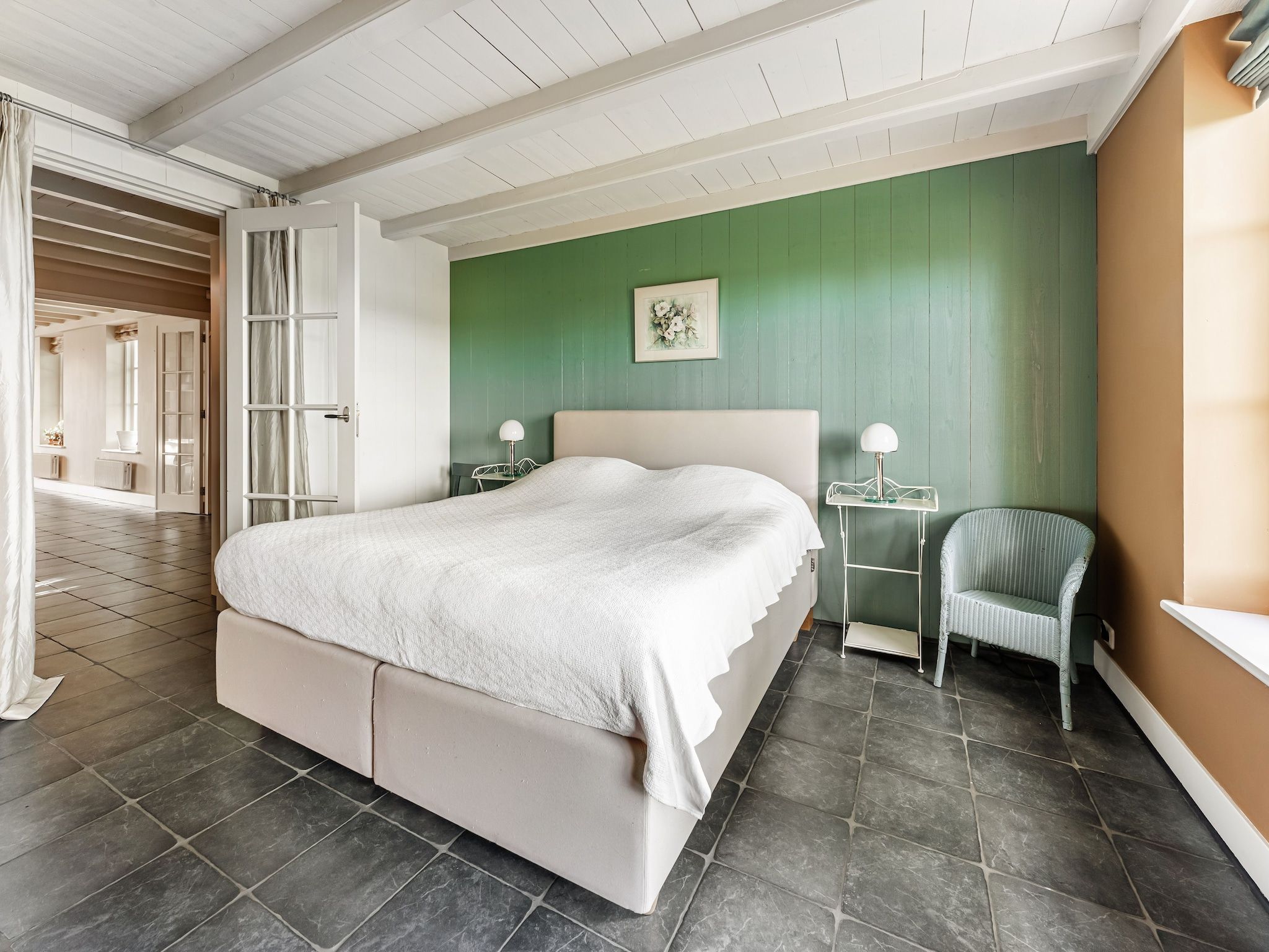 Een slaapkamer van De Pauwenhof in Heiloo