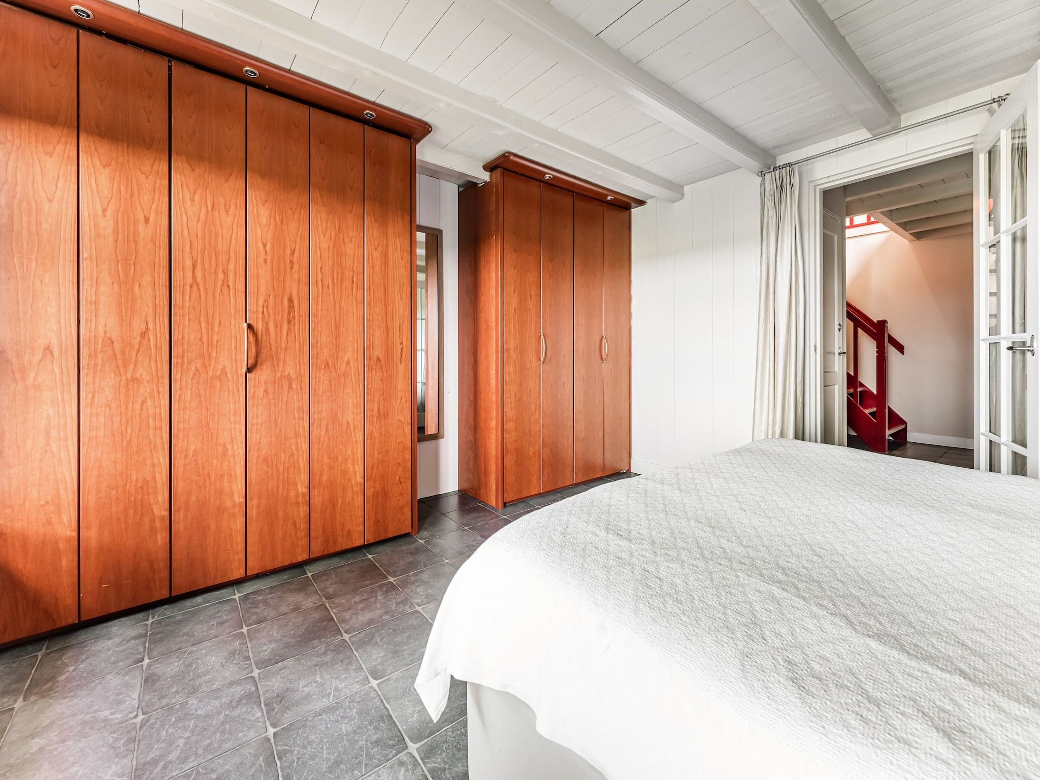 Een slaapkamer van De Pauwenhof in Heiloo