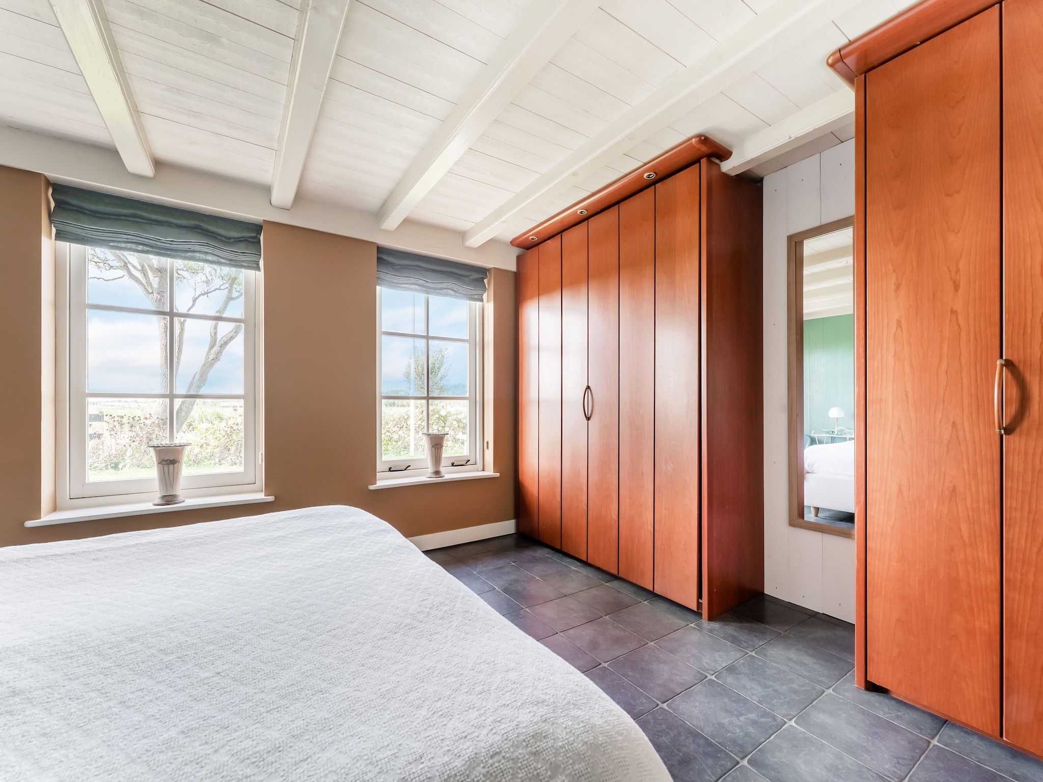 Een slaapkamer van De Pauwenhof in Heiloo