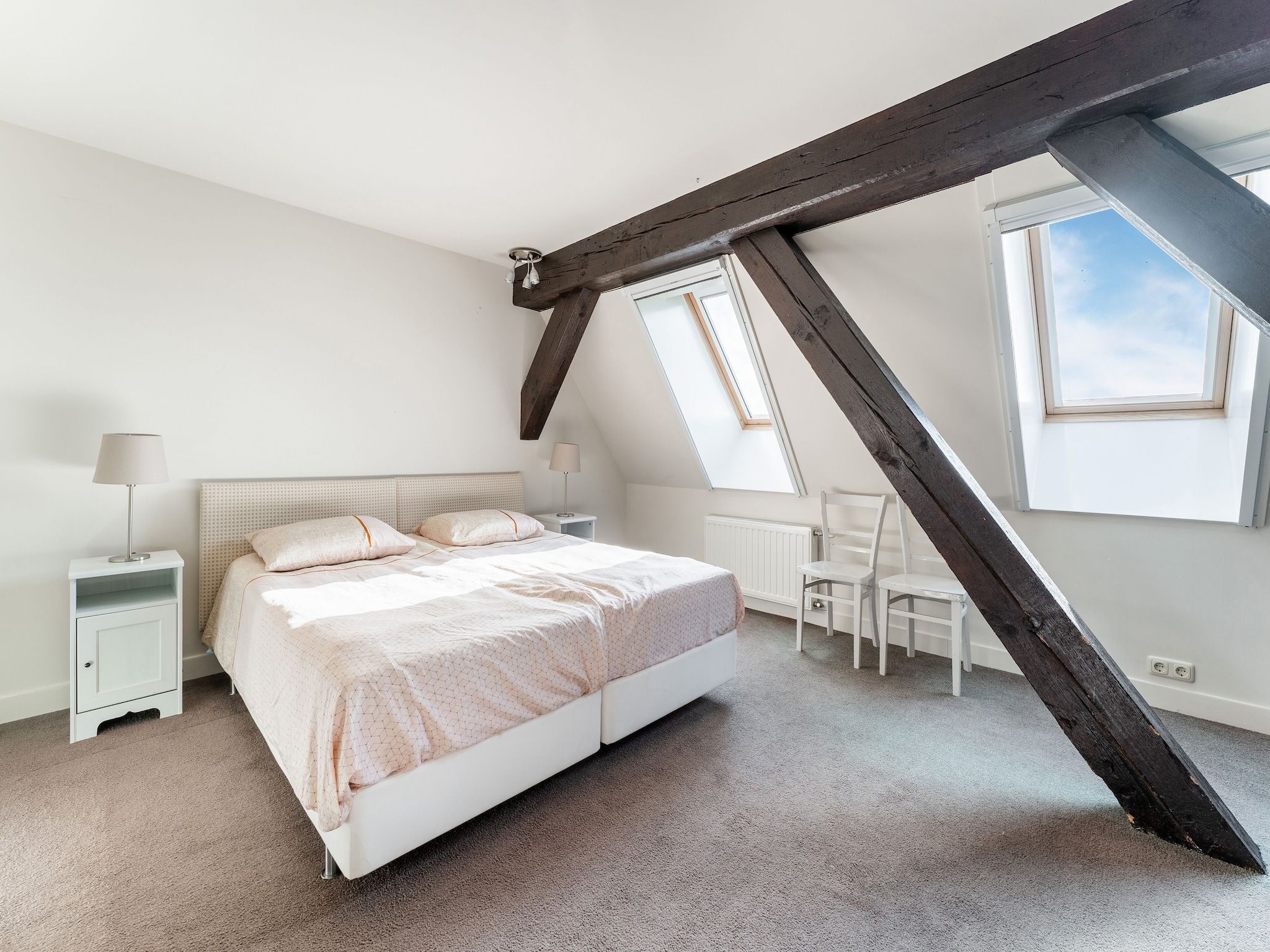 Een slaapkamer van De Pauwenhof in Heiloo