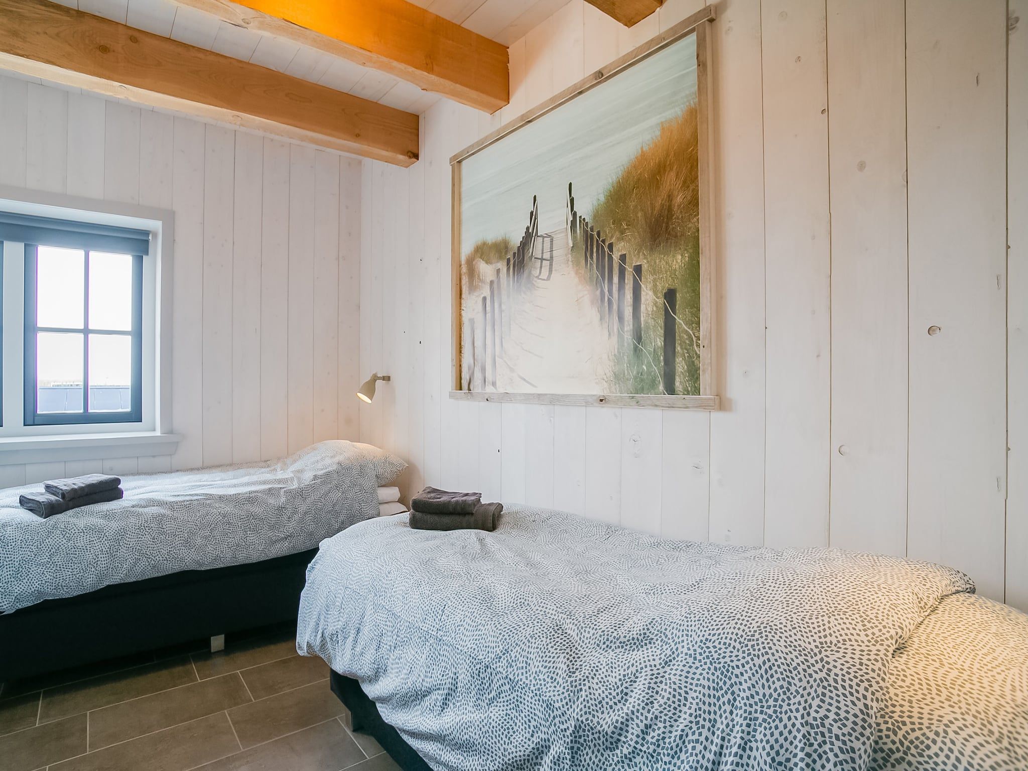 Een slaapkamer van Hazenborgh - Duinhuis 2 in Callantsoog