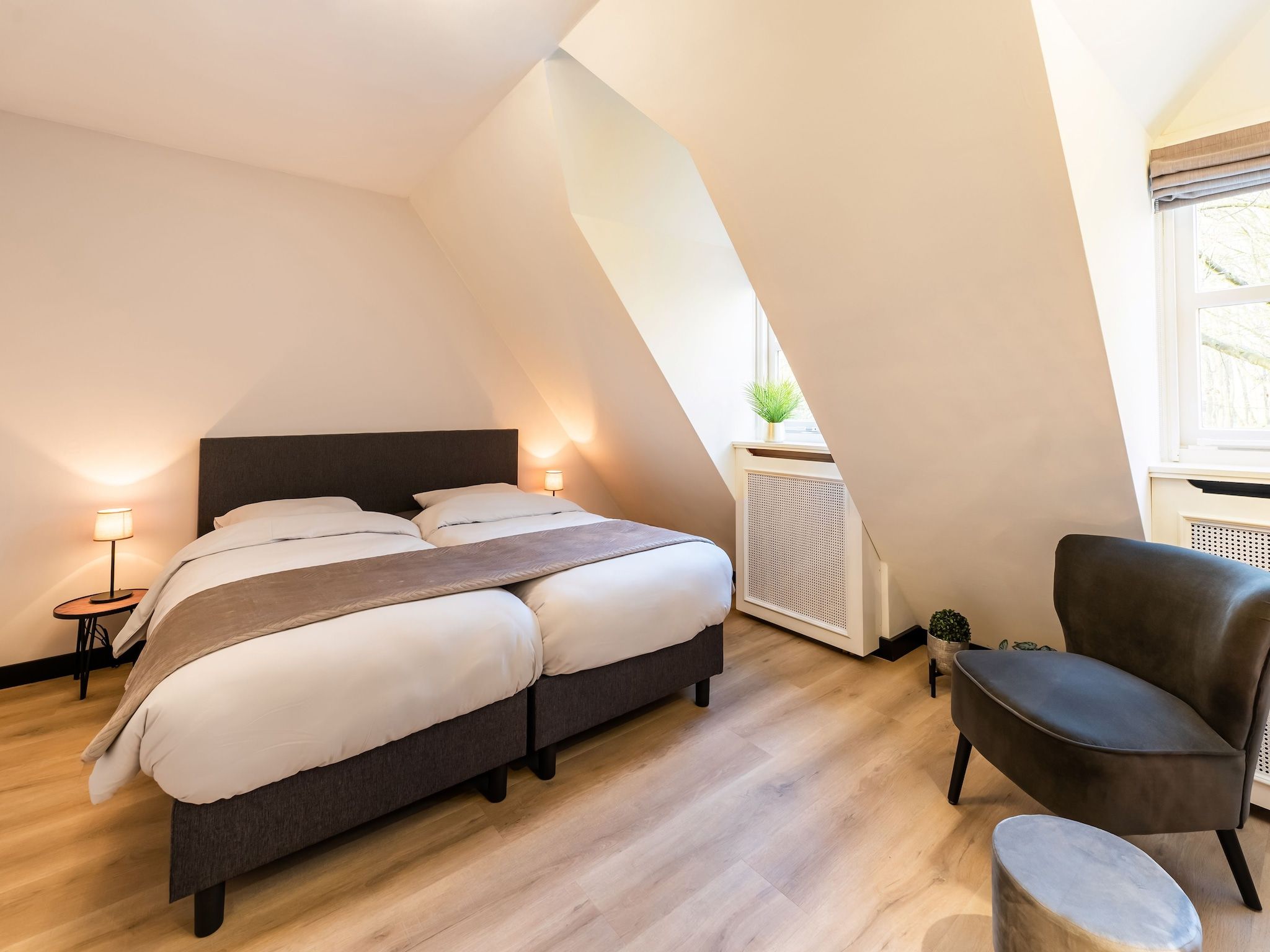 Een slaapkamer van Villa Loonse Duinen in Drunen