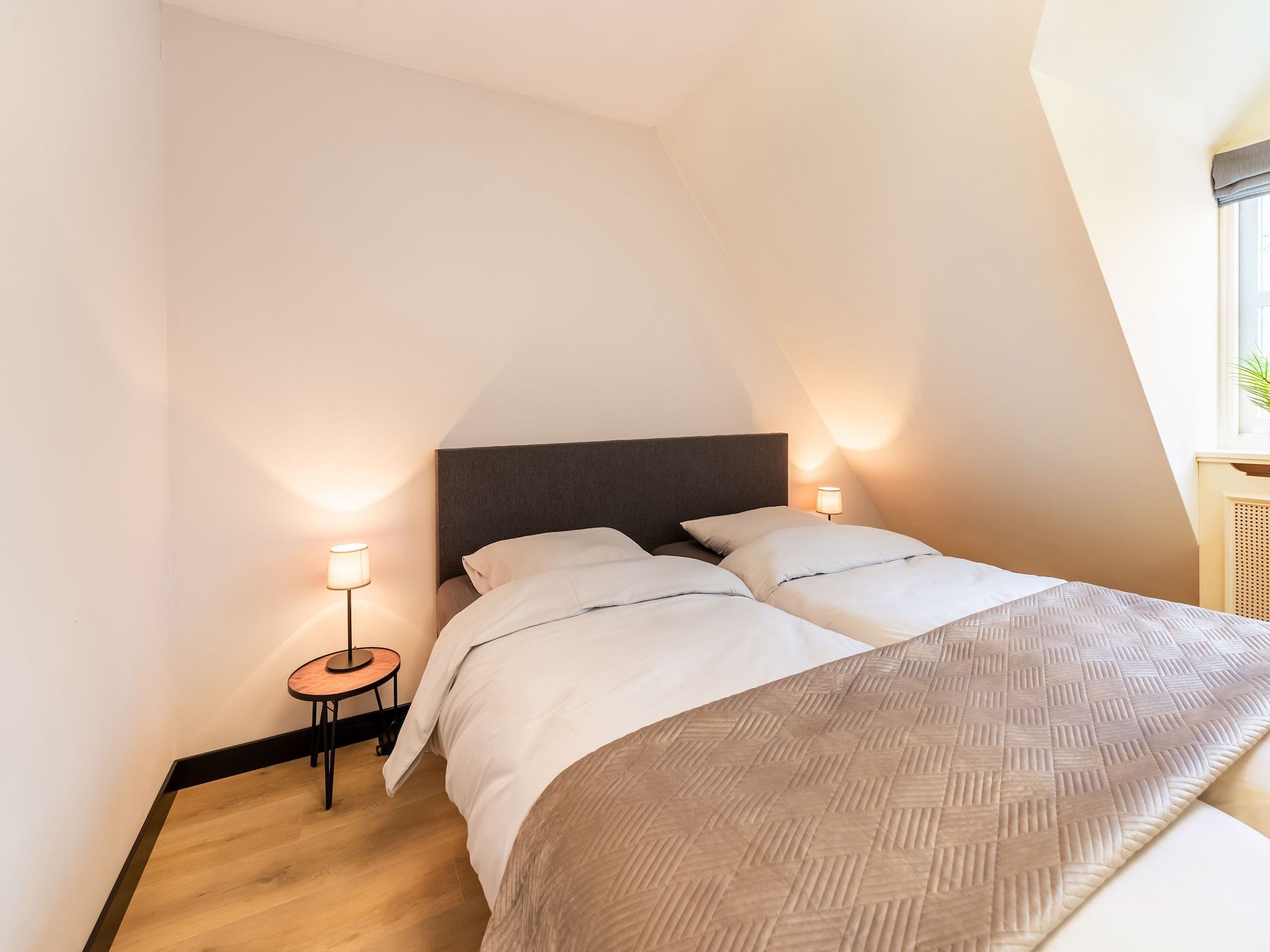 Een slaapkamer van Villa Loonse Duinen in Drunen