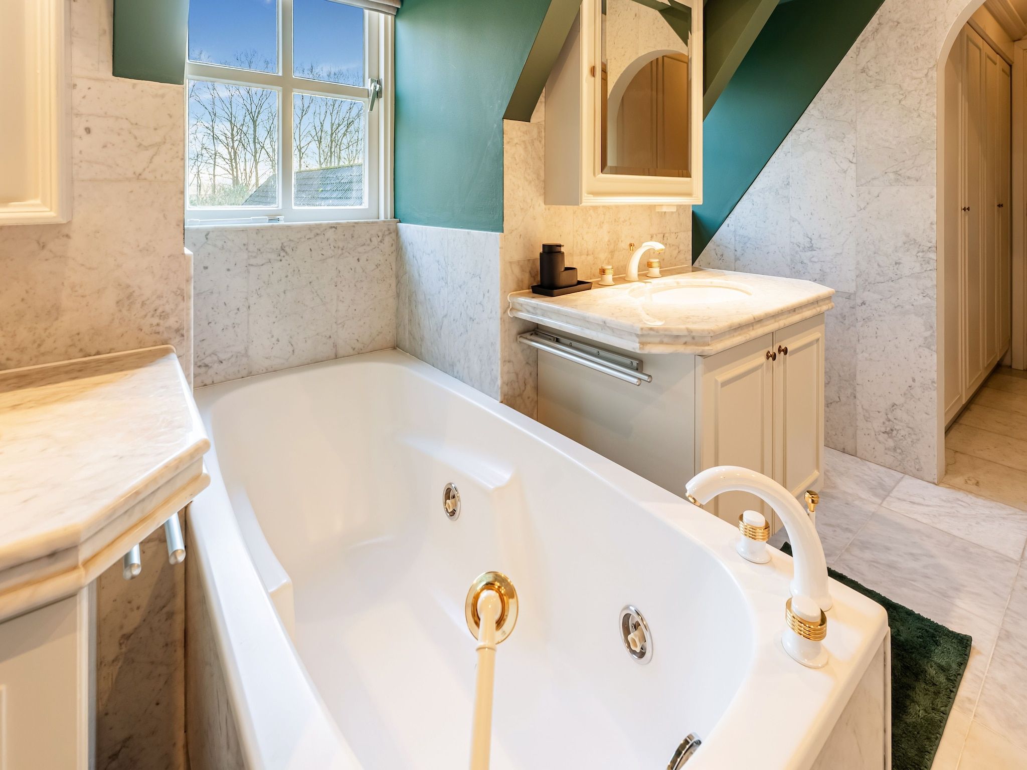 De badkamer van Villa Loonse Duinen in Drunen