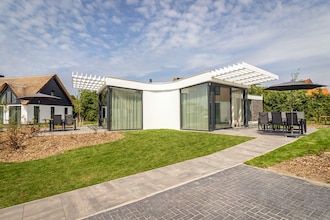Villa bij Texel Strand met privé sauna in De Koog