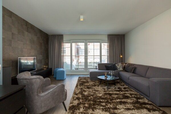 Woonkamer - Appartement bij Zuidstrand met Sauna in Koudekerke (2)