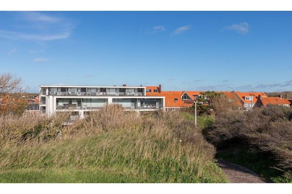 AreaSummer1KM - Romantisch vakantiehuis aan de kust met balkon in Zoutelande (2)