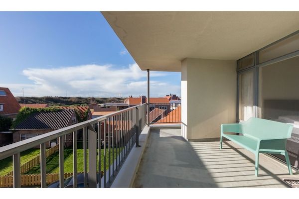 Terras - Romantisch vakantiehuis aan de kust met balkon in Zoutelande (1)